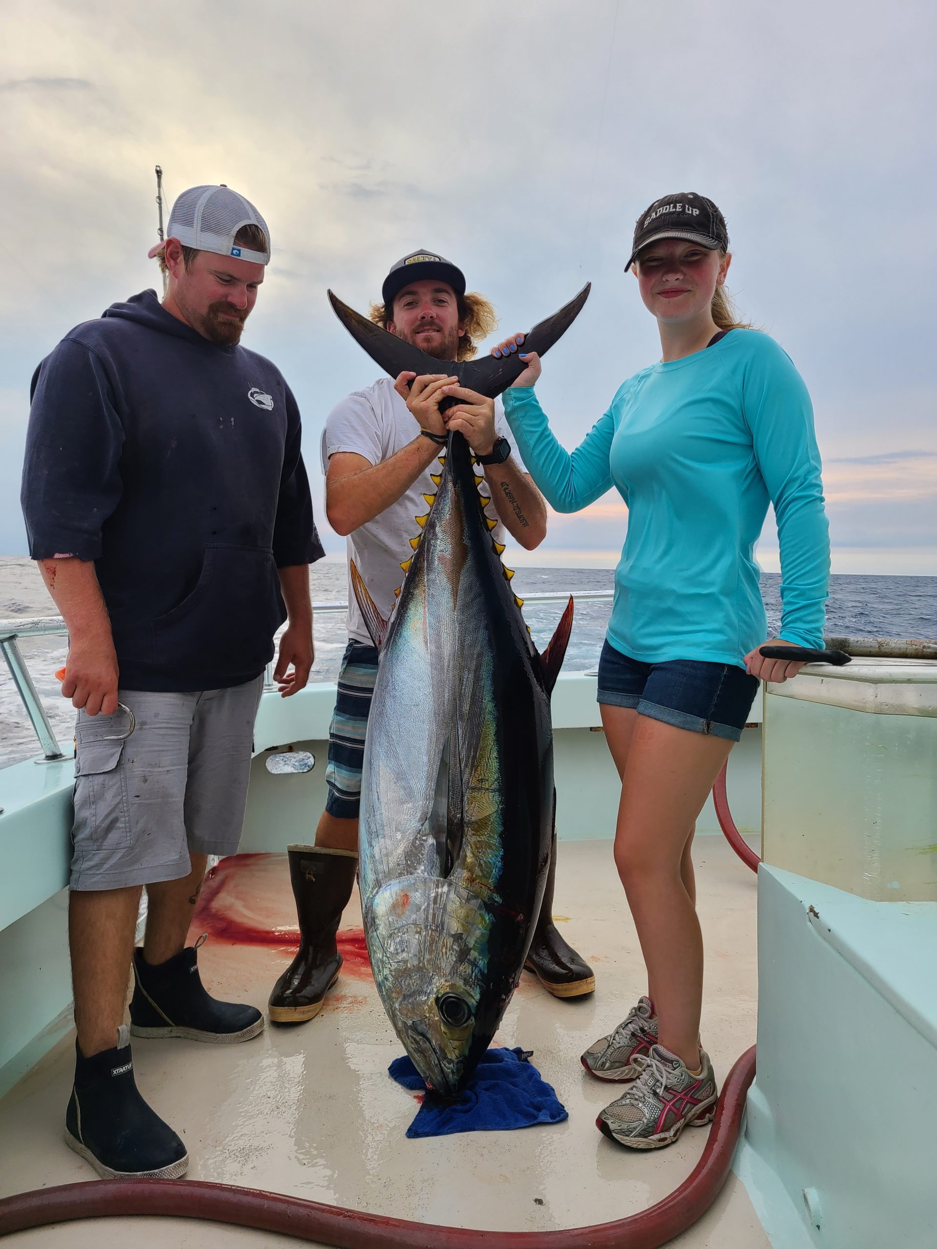 a person holding a fish