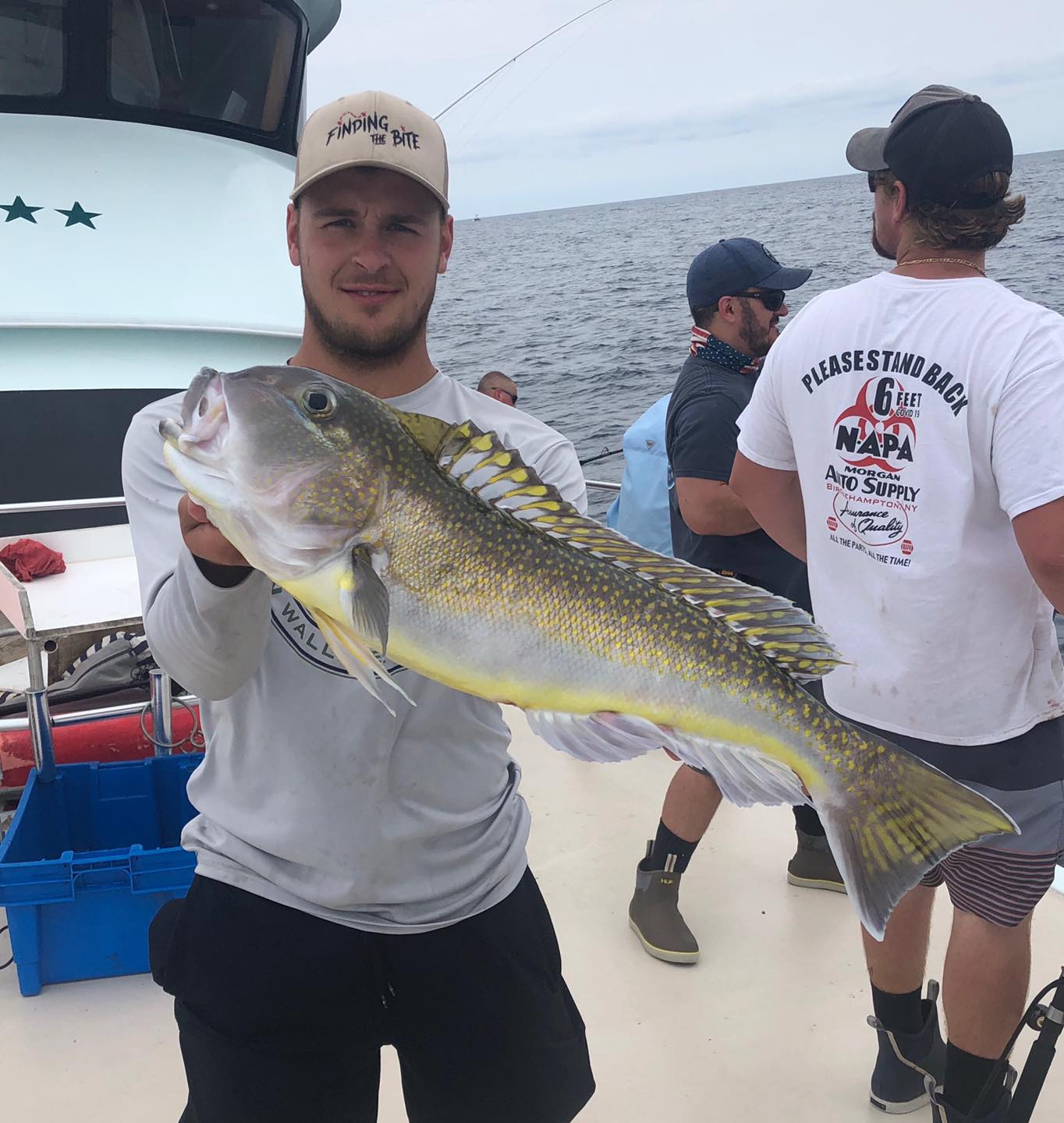 a person holding a fish