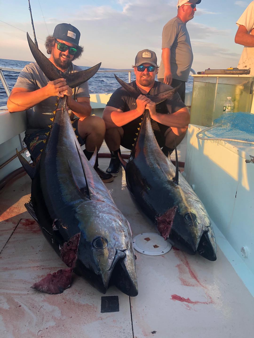 a person holding a fish