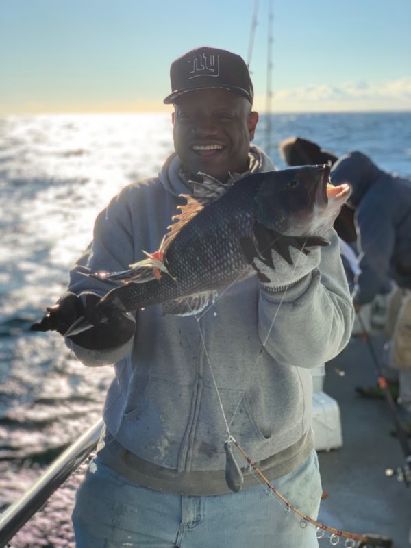 a person holding a glass of water