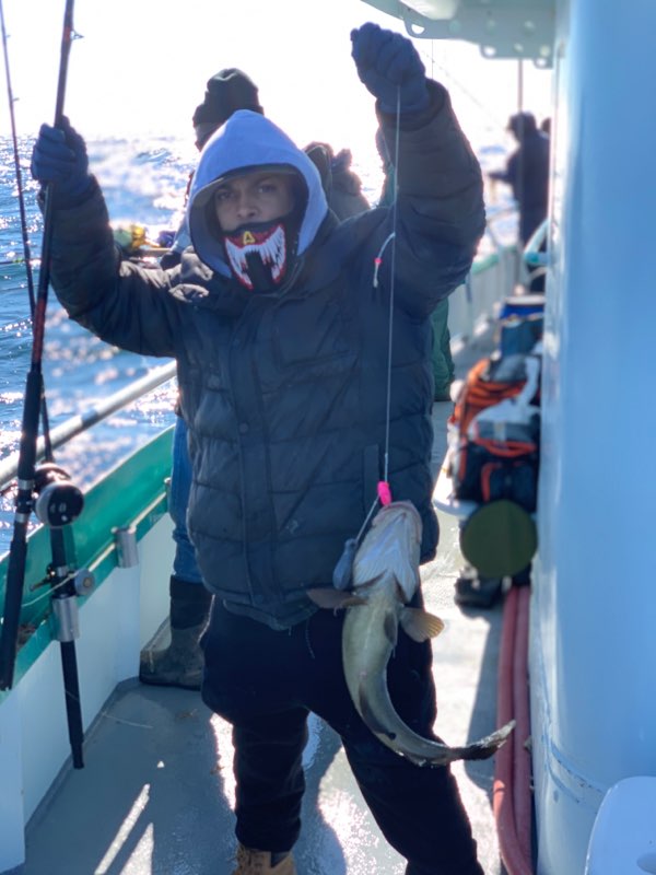 a couple of people that are standing in the snow