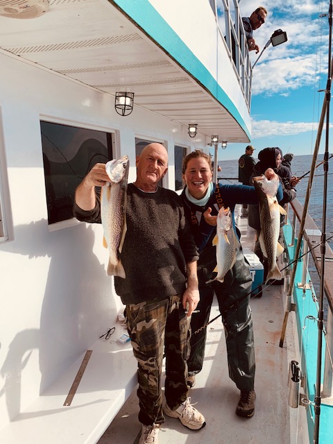 a group of people posing for the camera