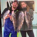 a person holding a fish