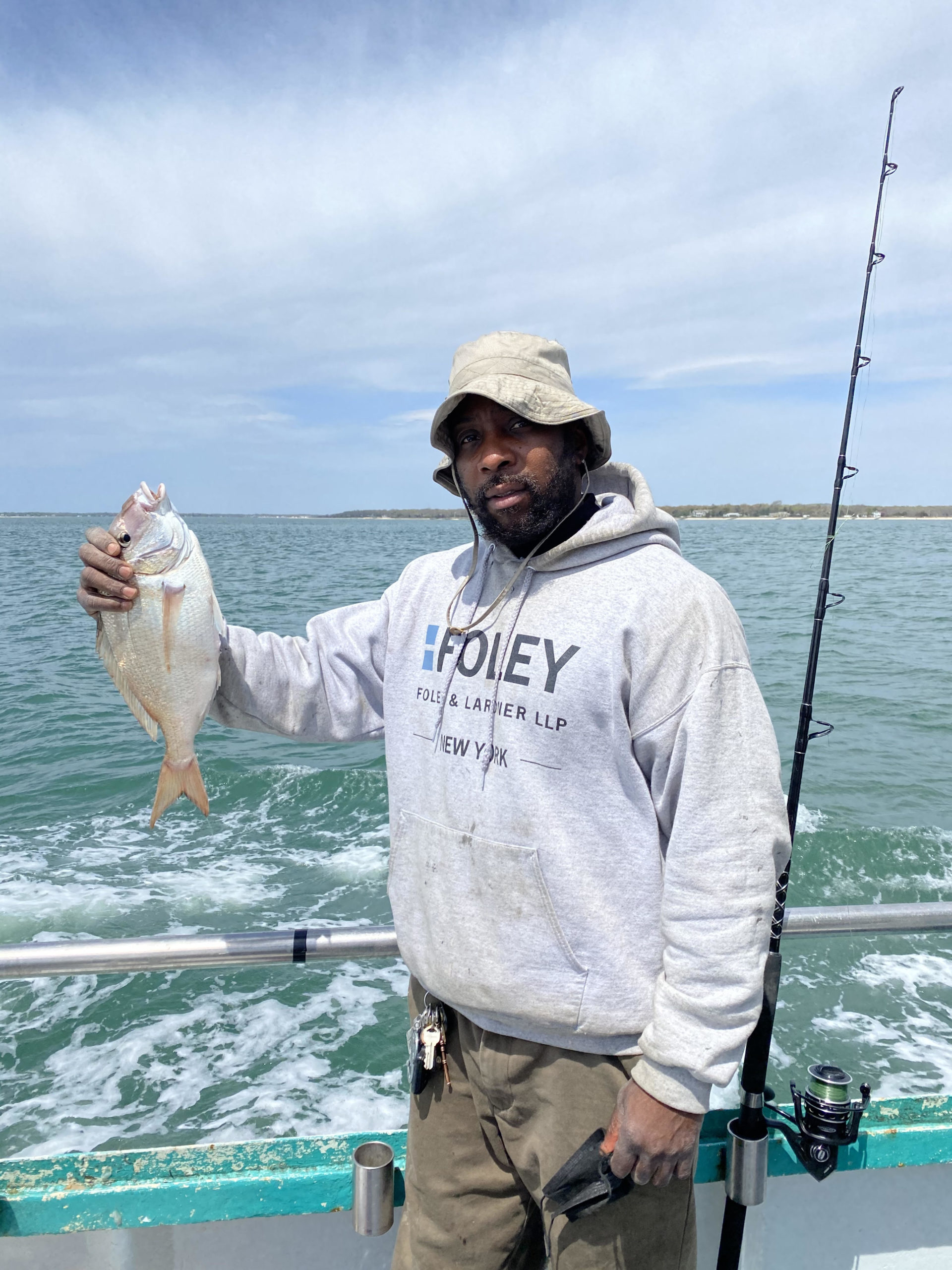 John Faulkner standing next to a body of water
