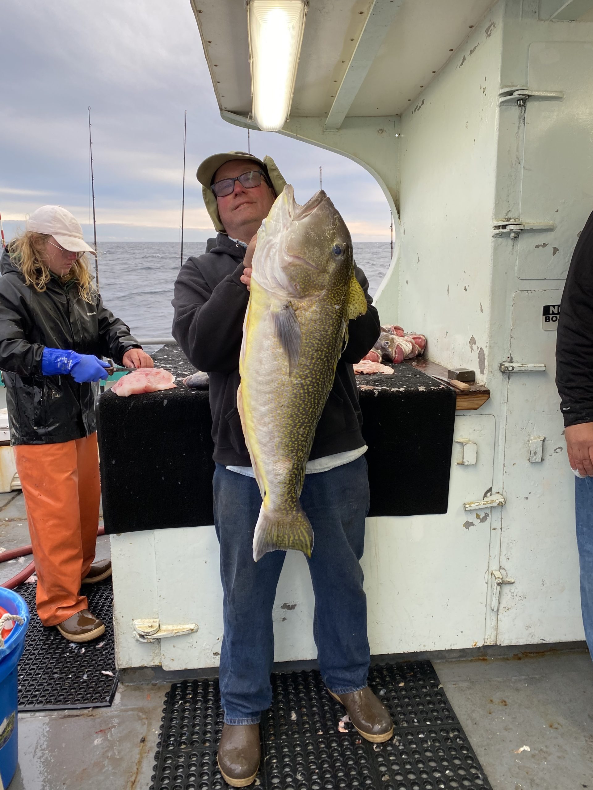 a person holding a fish