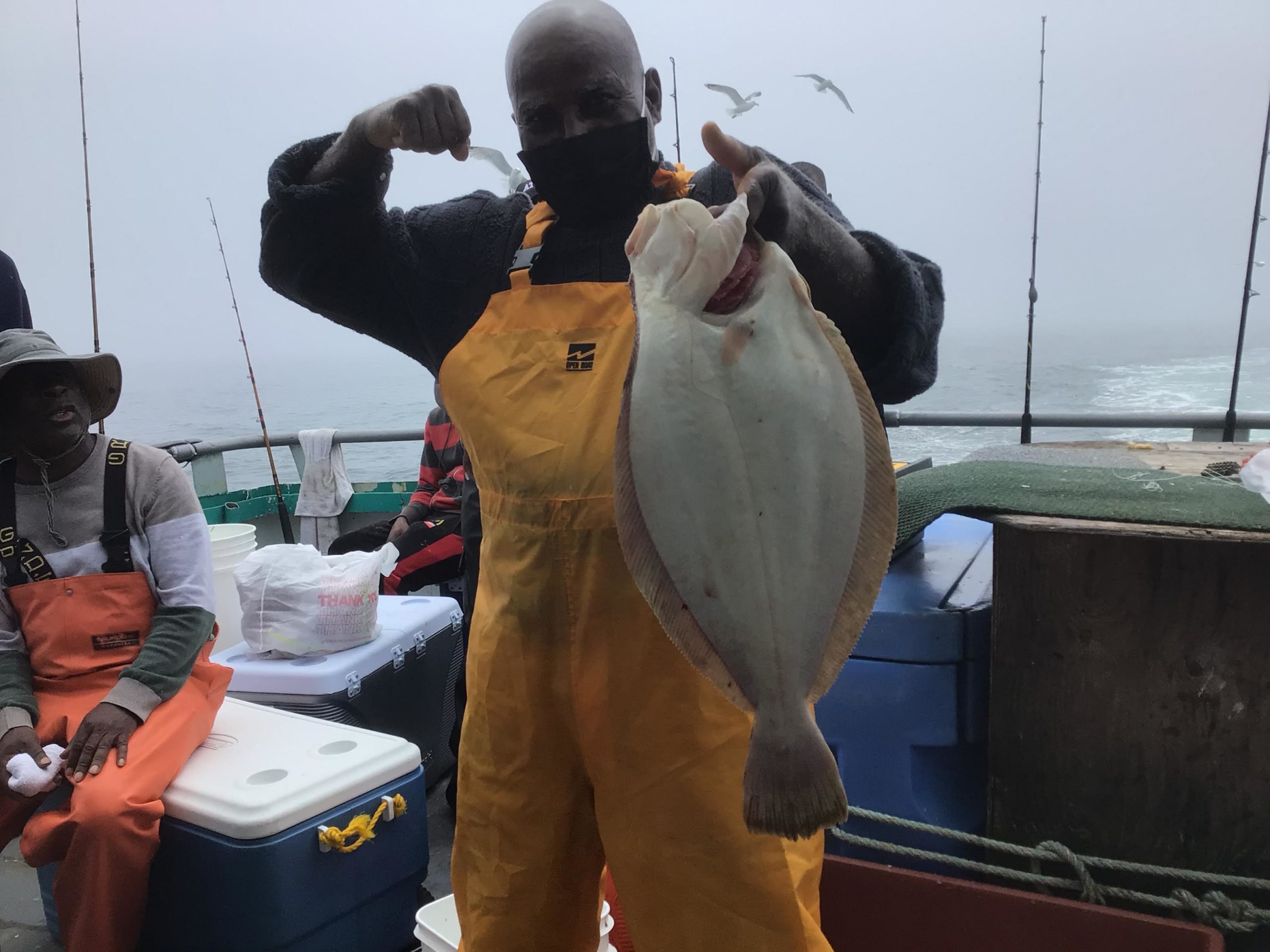 a person holding a fish