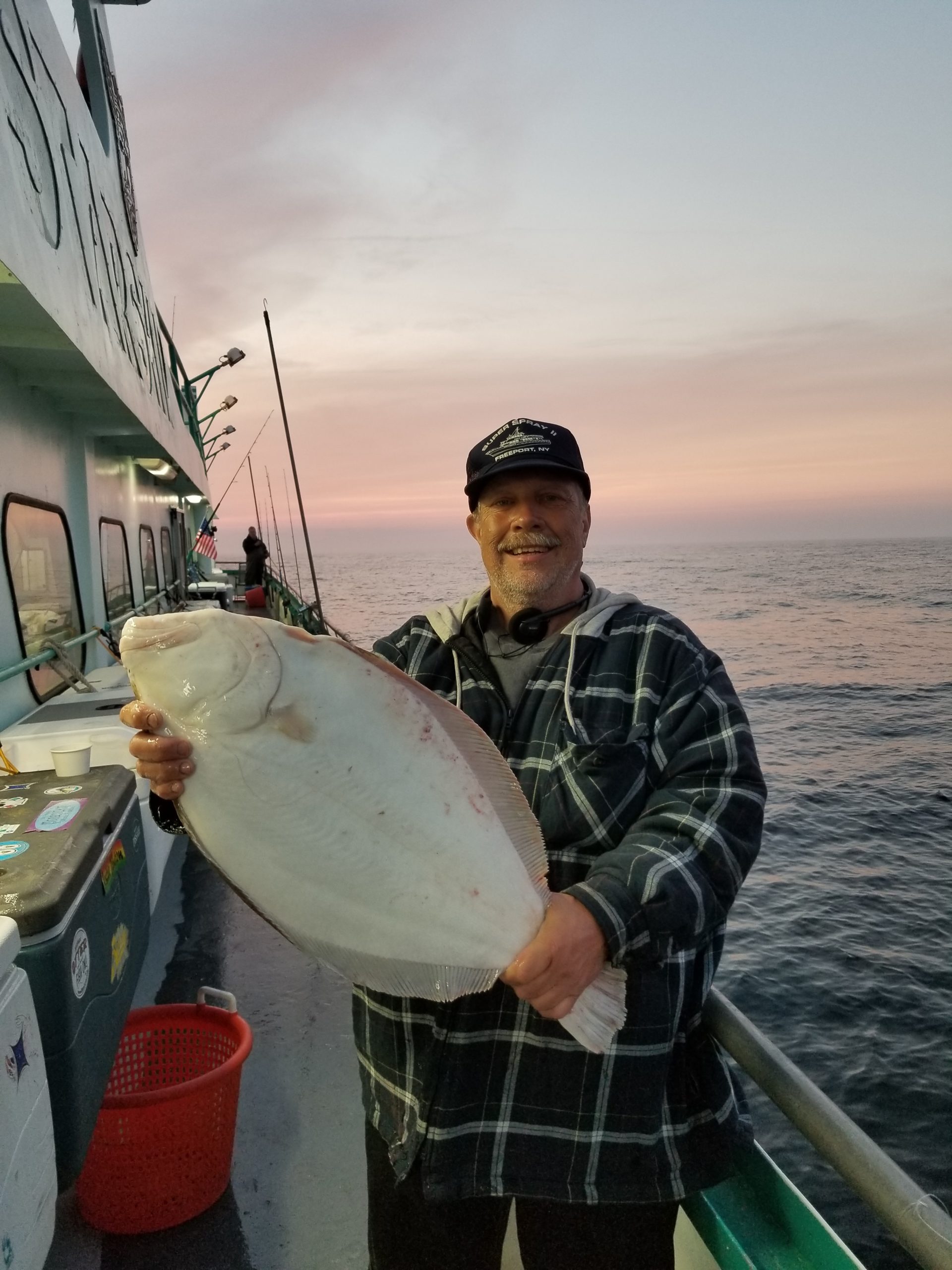 a man standing on a boat in the water