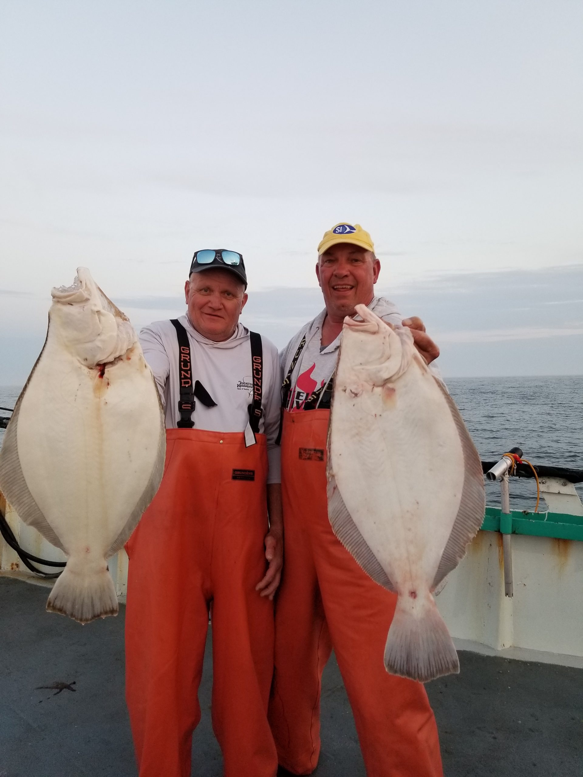 a person holding a fish
