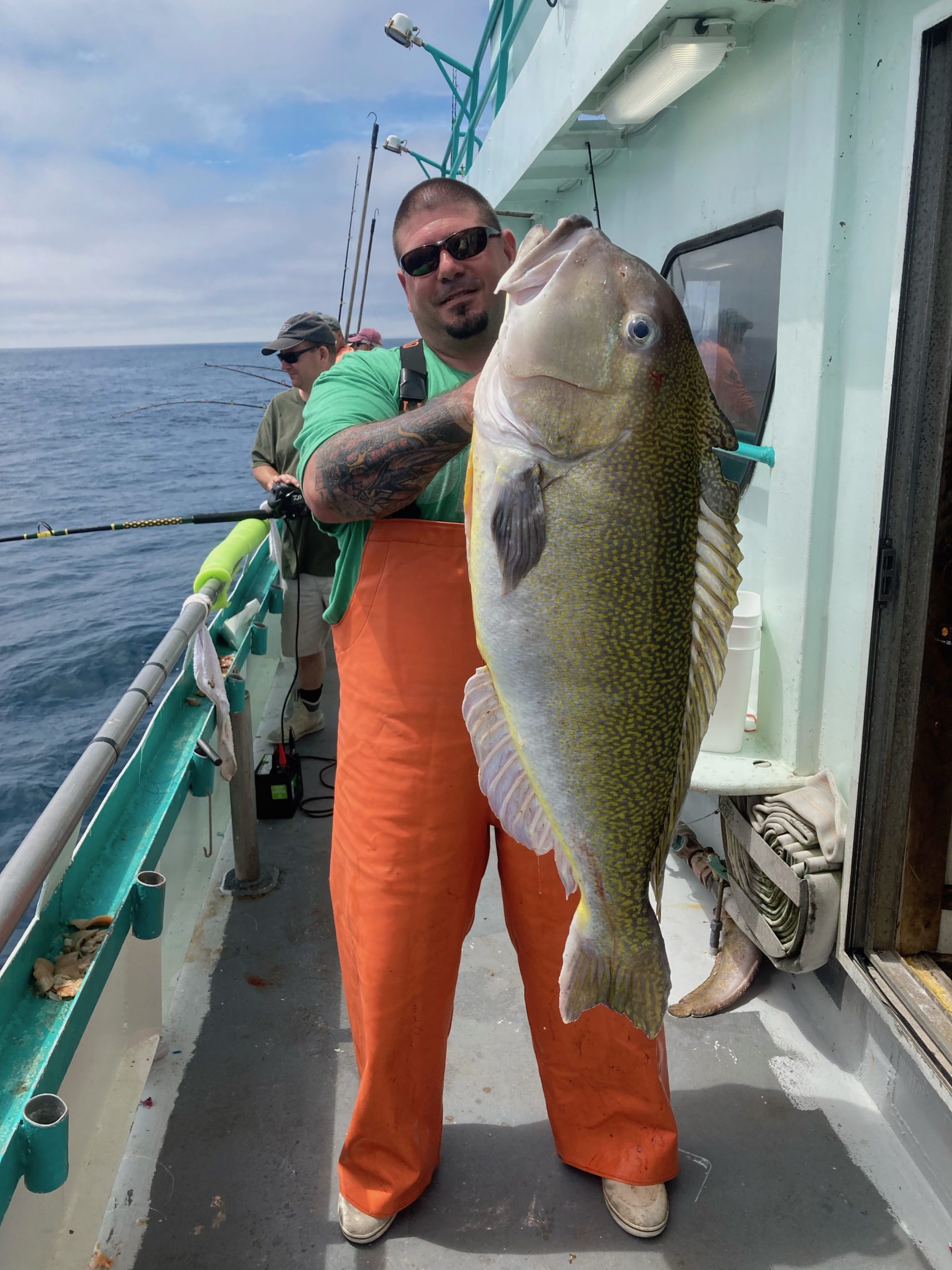 a person holding a fish