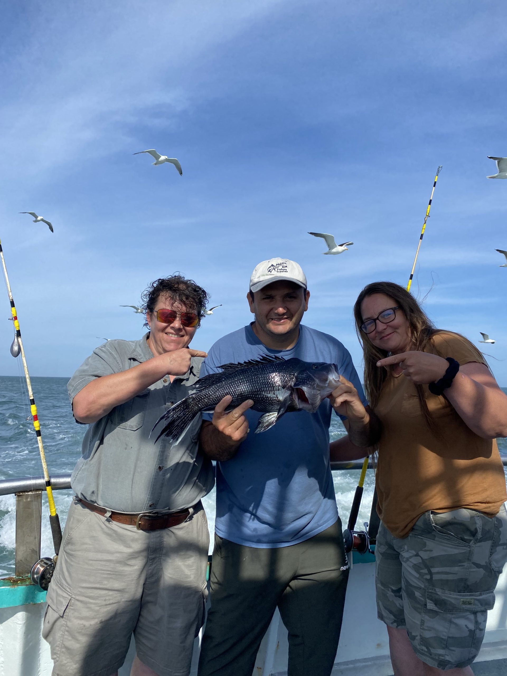 a group of people flying a kite