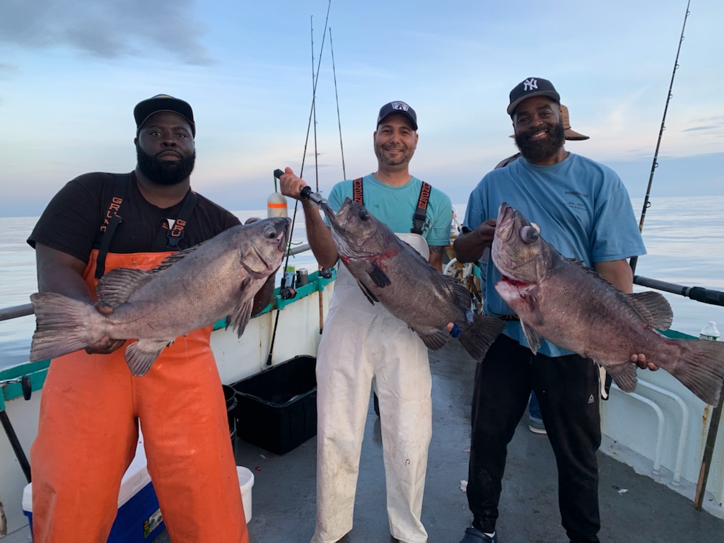 a person holding a fish