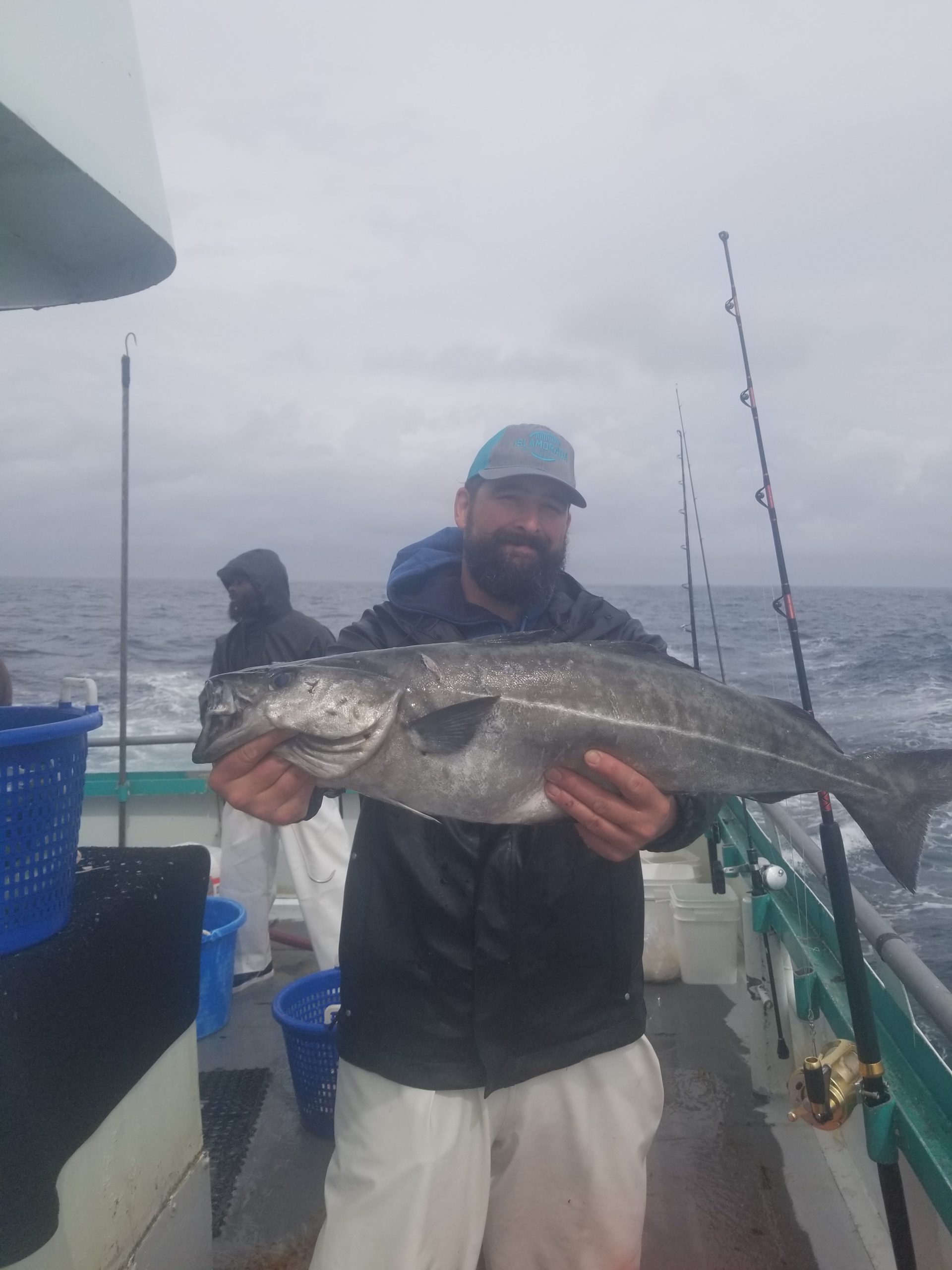 a man holding a fish