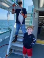 a person standing posing for the camera