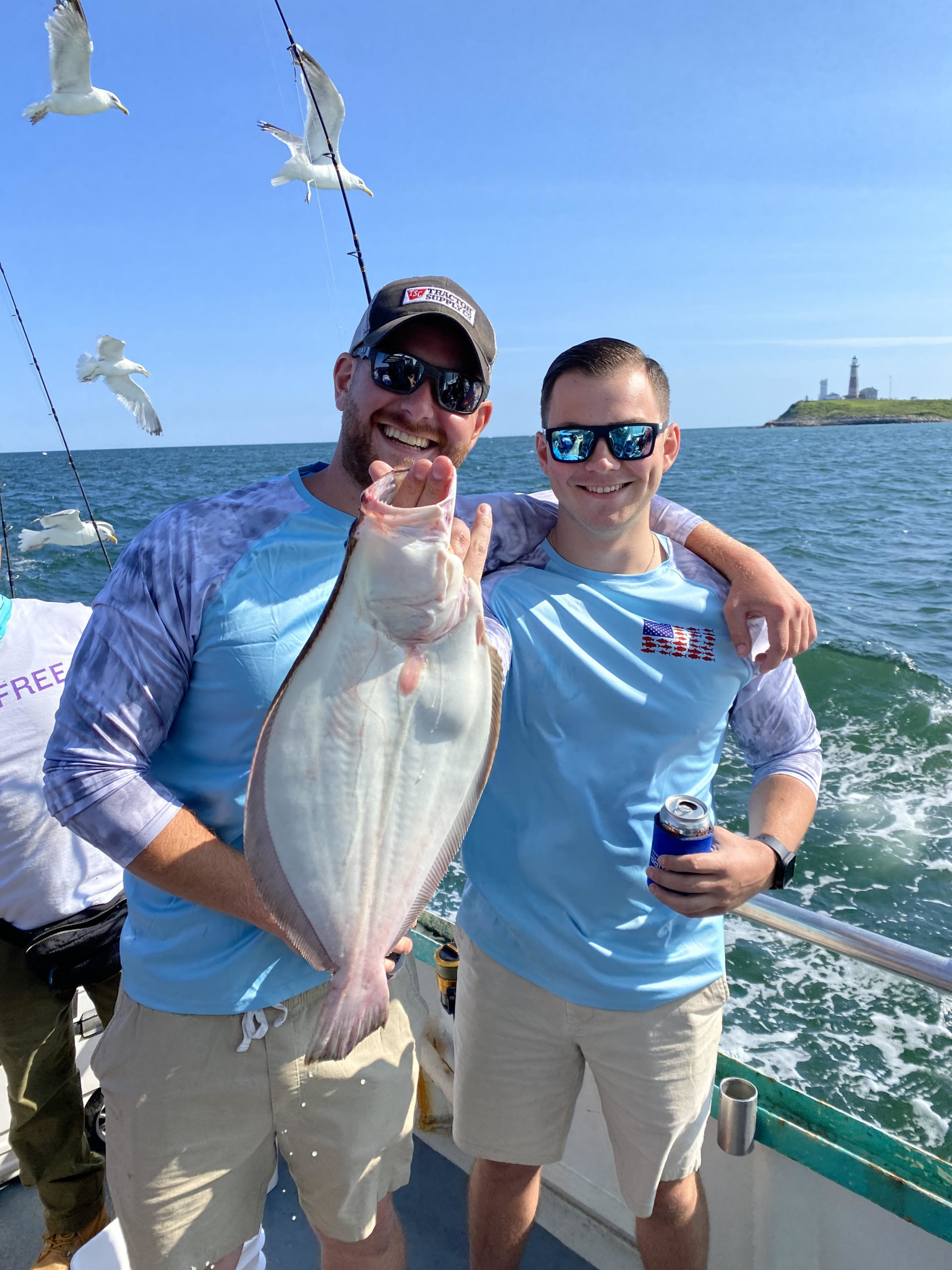 a person holding a fish in the water