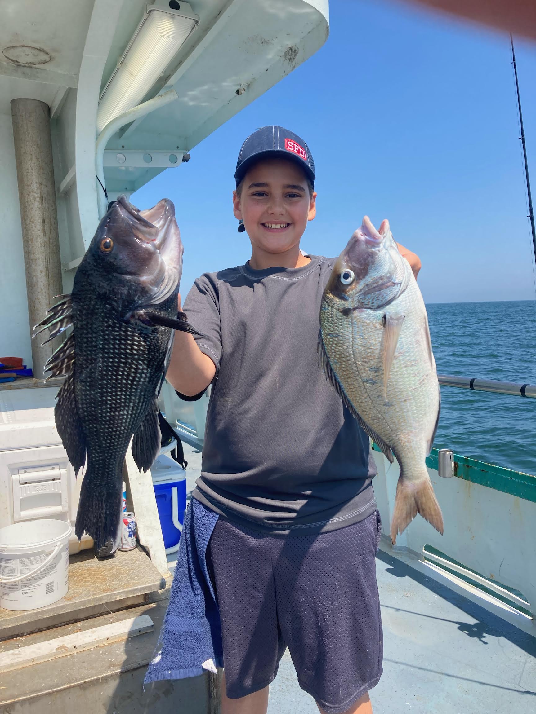 a person holding a fish