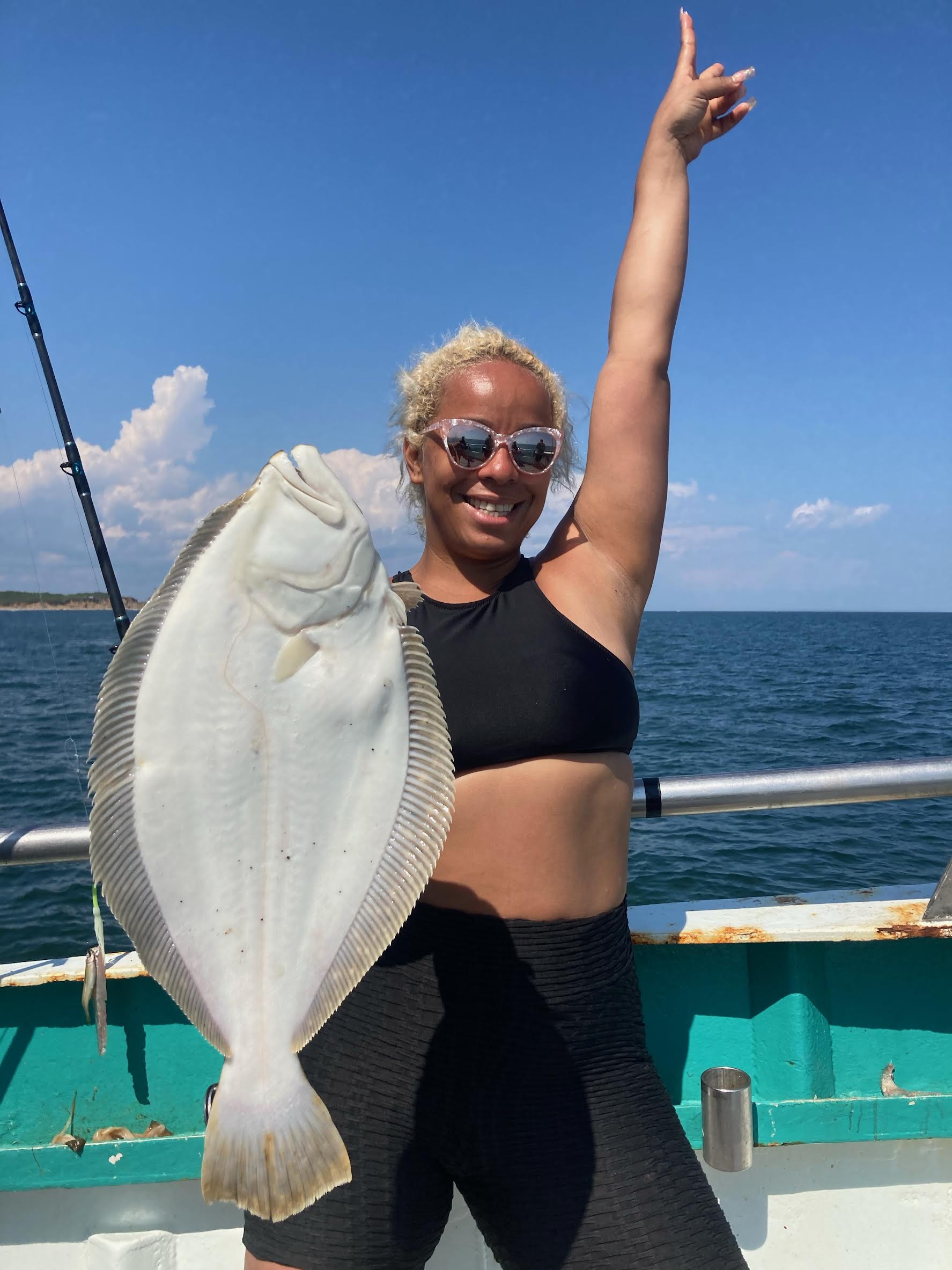 a person standing in front of a body of water