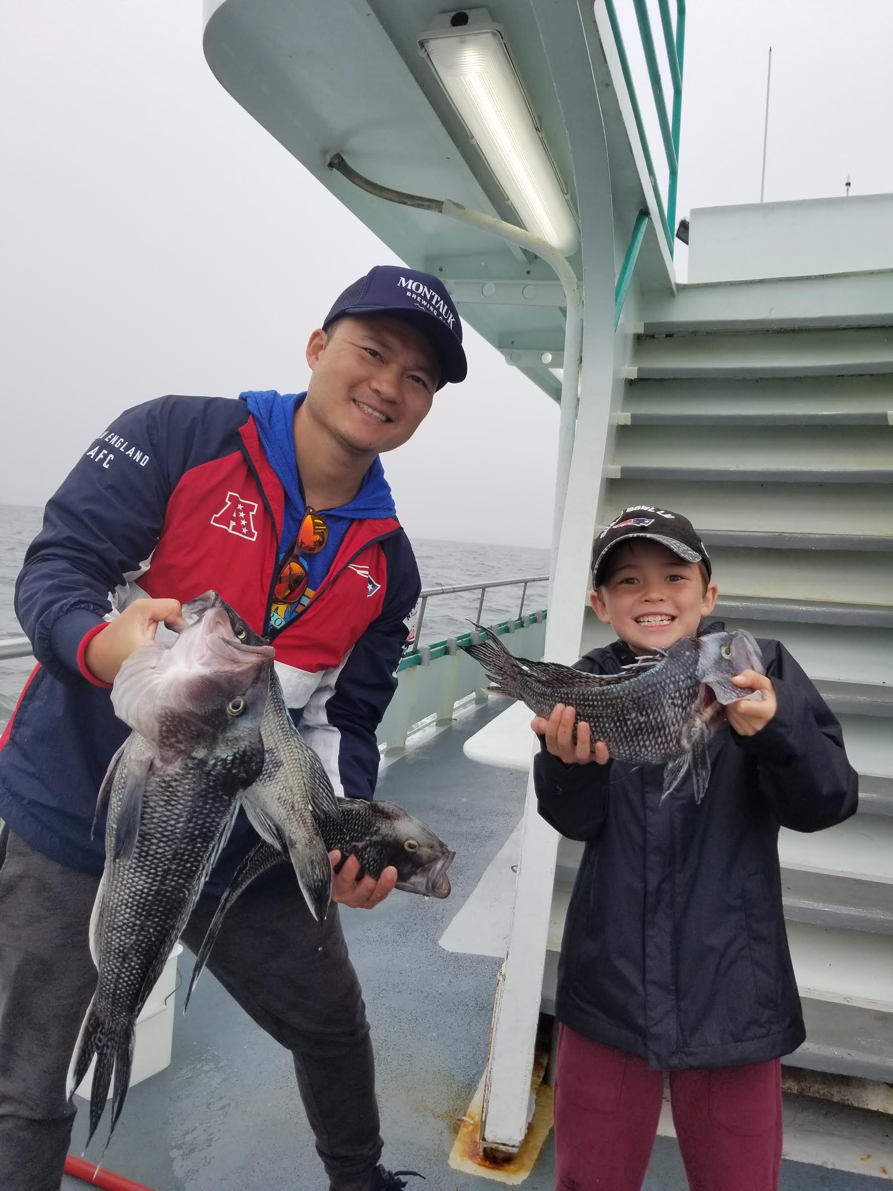 a person holding a fish