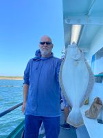 a person that is standing in the water