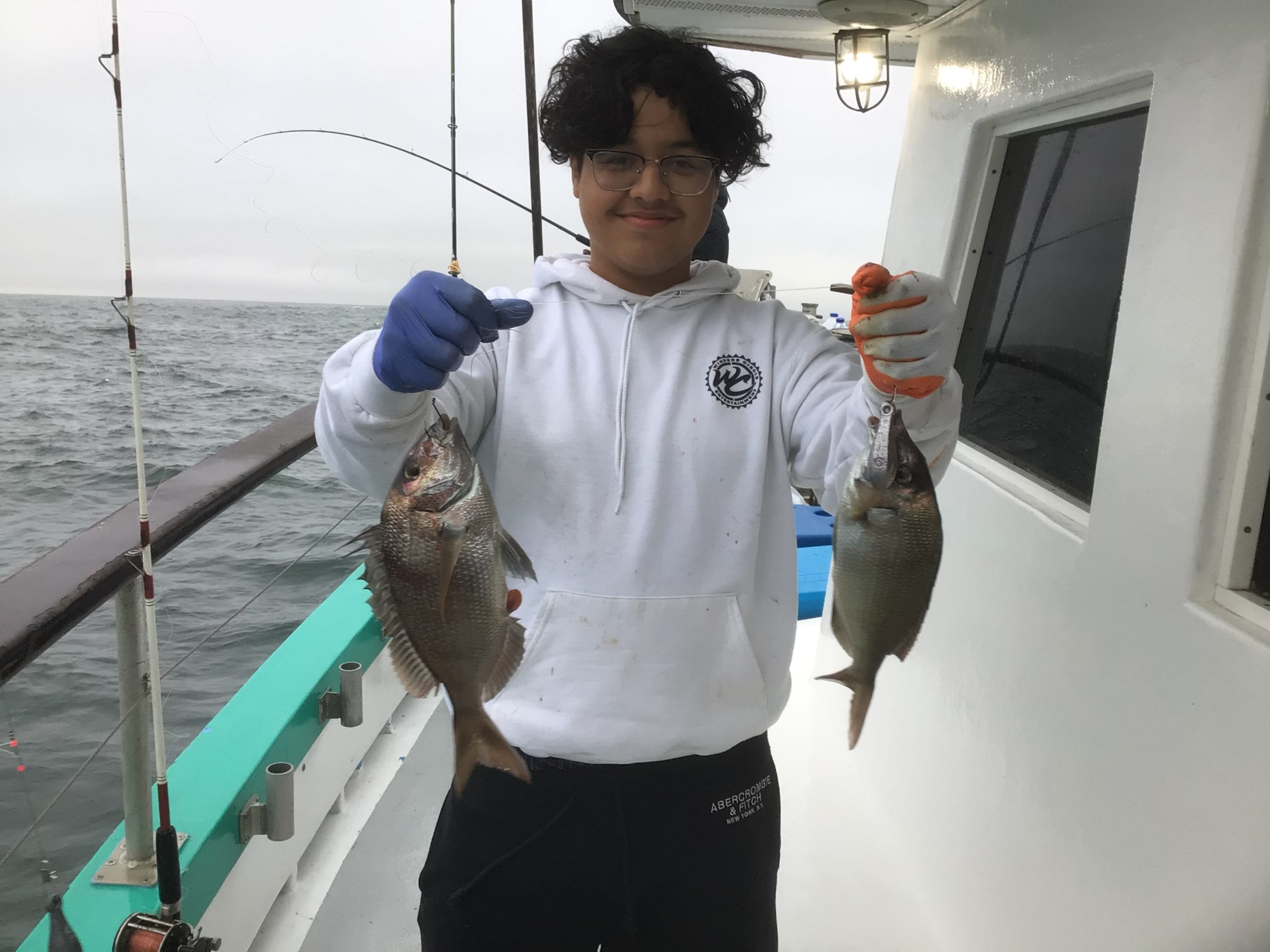 a man holding a fish
