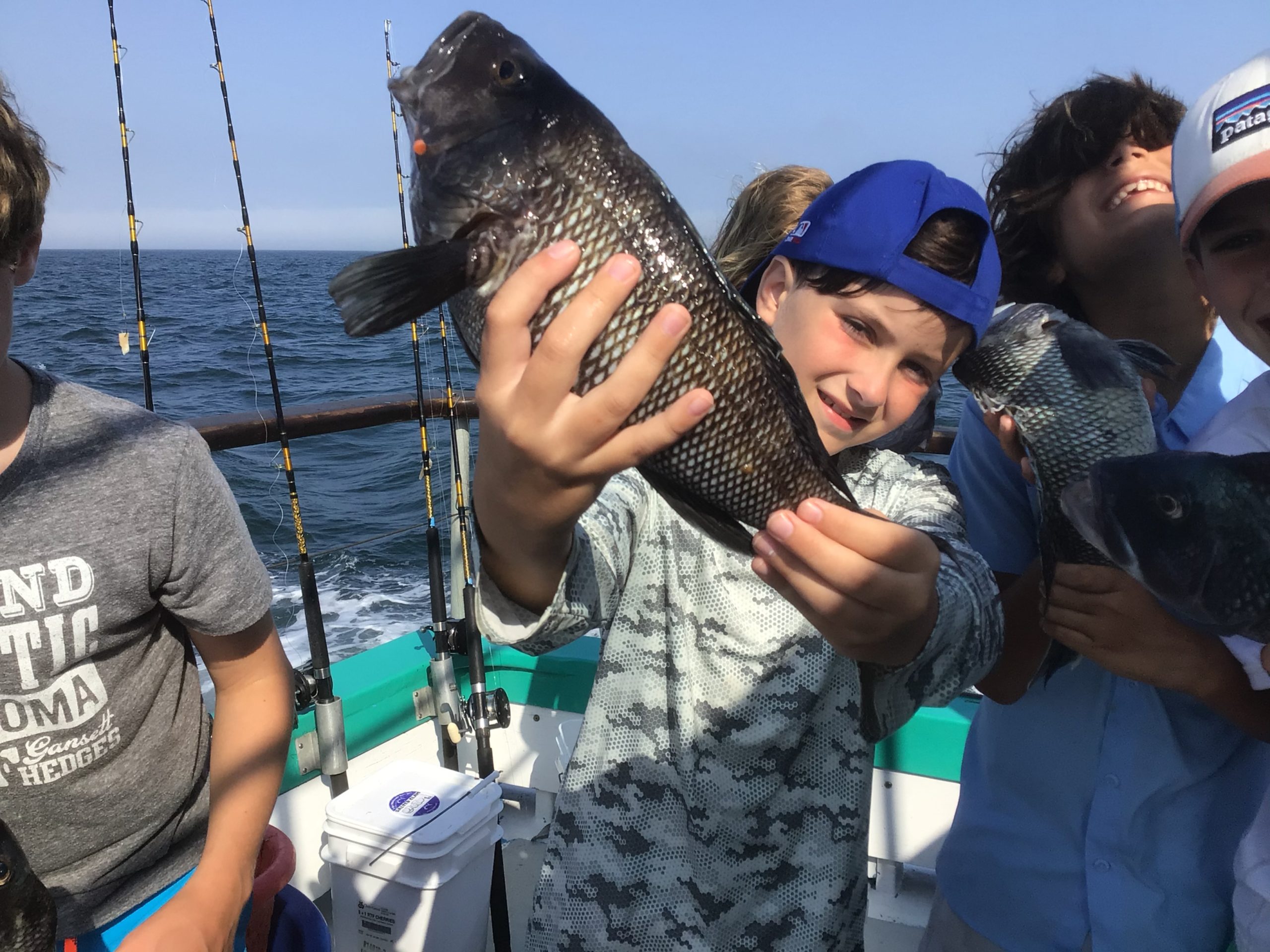 a person holding a fish