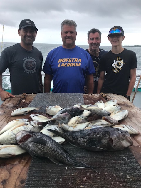 a group of people posing for the camera