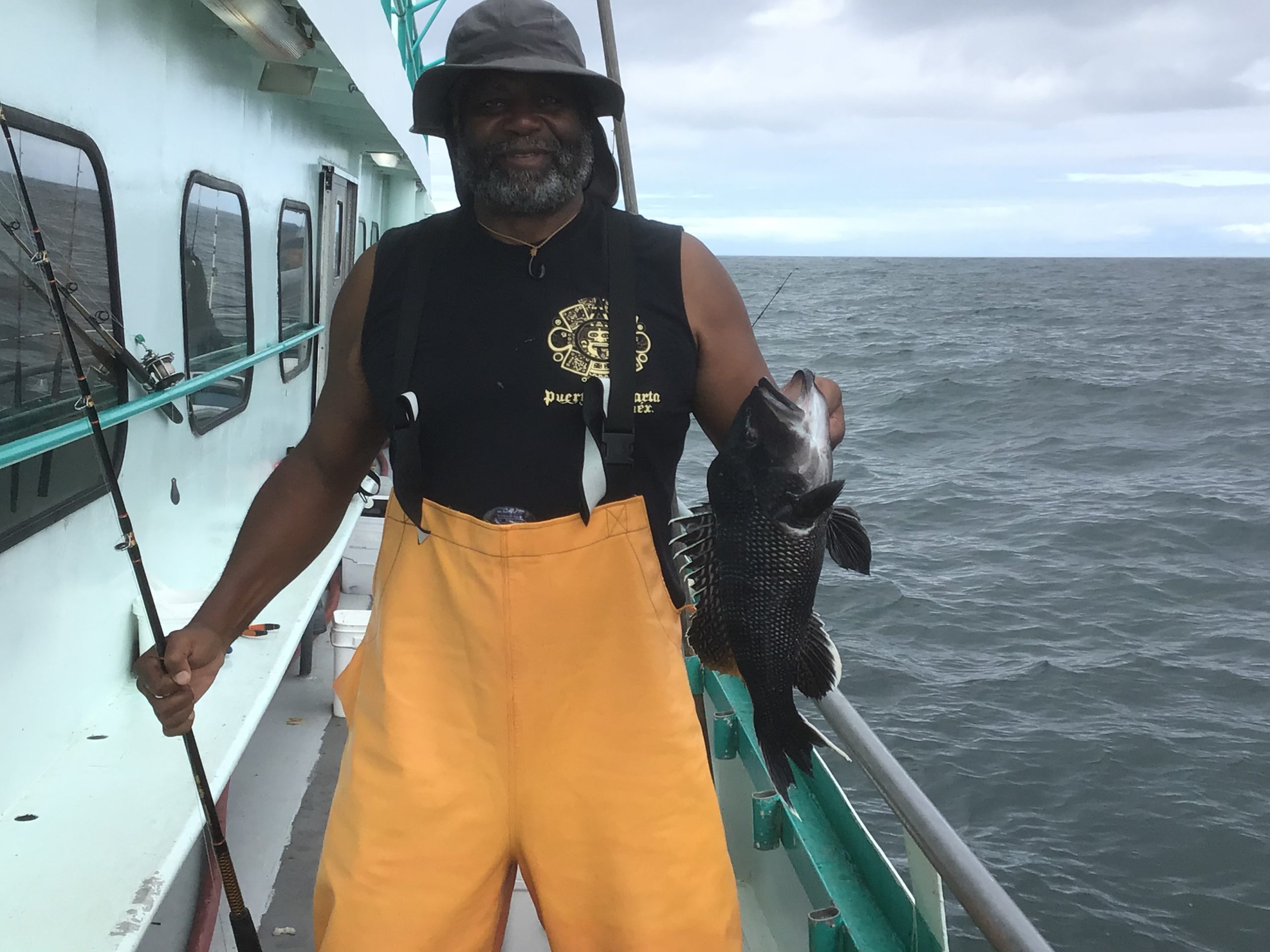 a man that is standing in the water