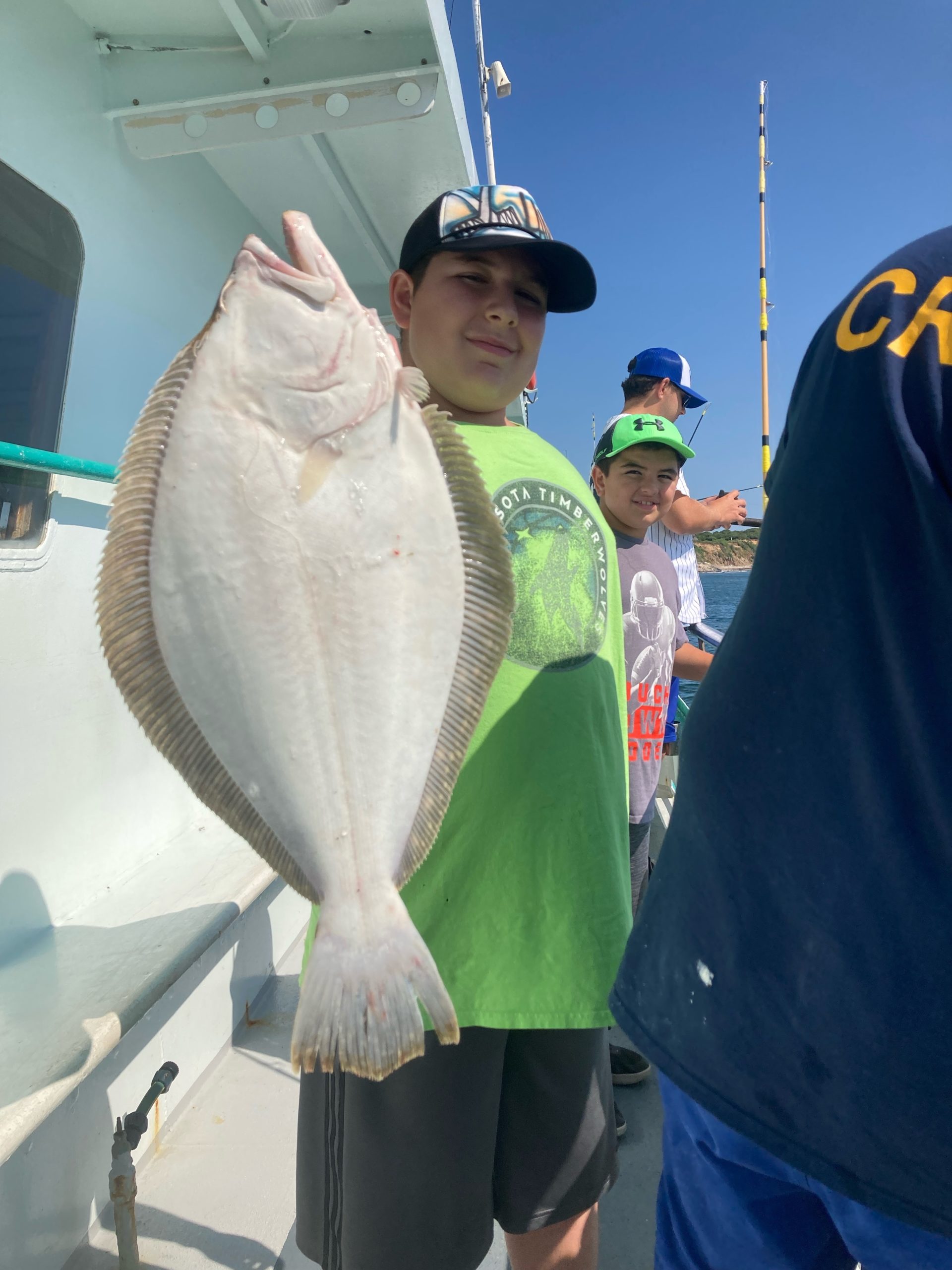 a person holding a fish