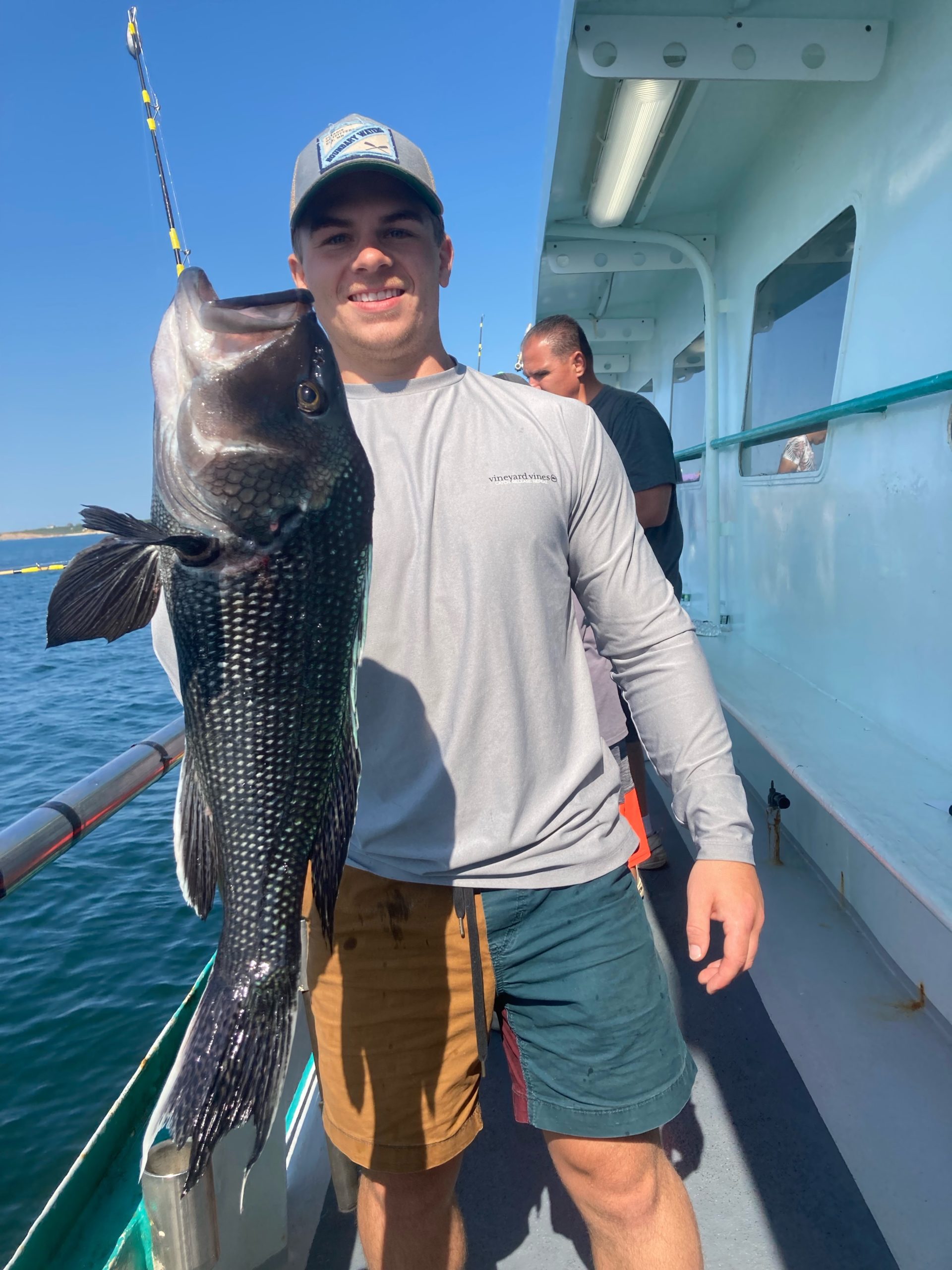 a person holding a fish