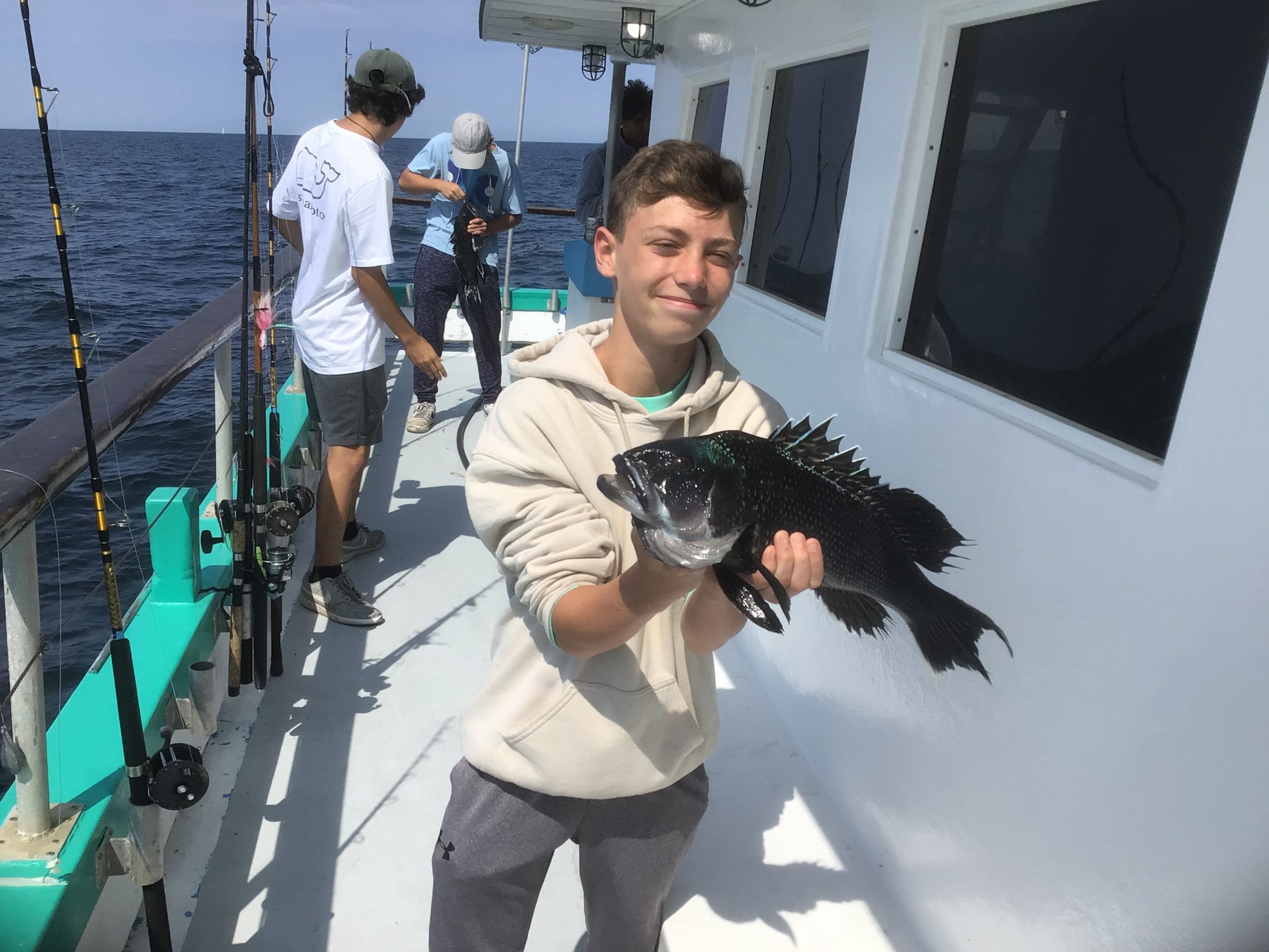 Prince Nikolai of Denmark holding a fish