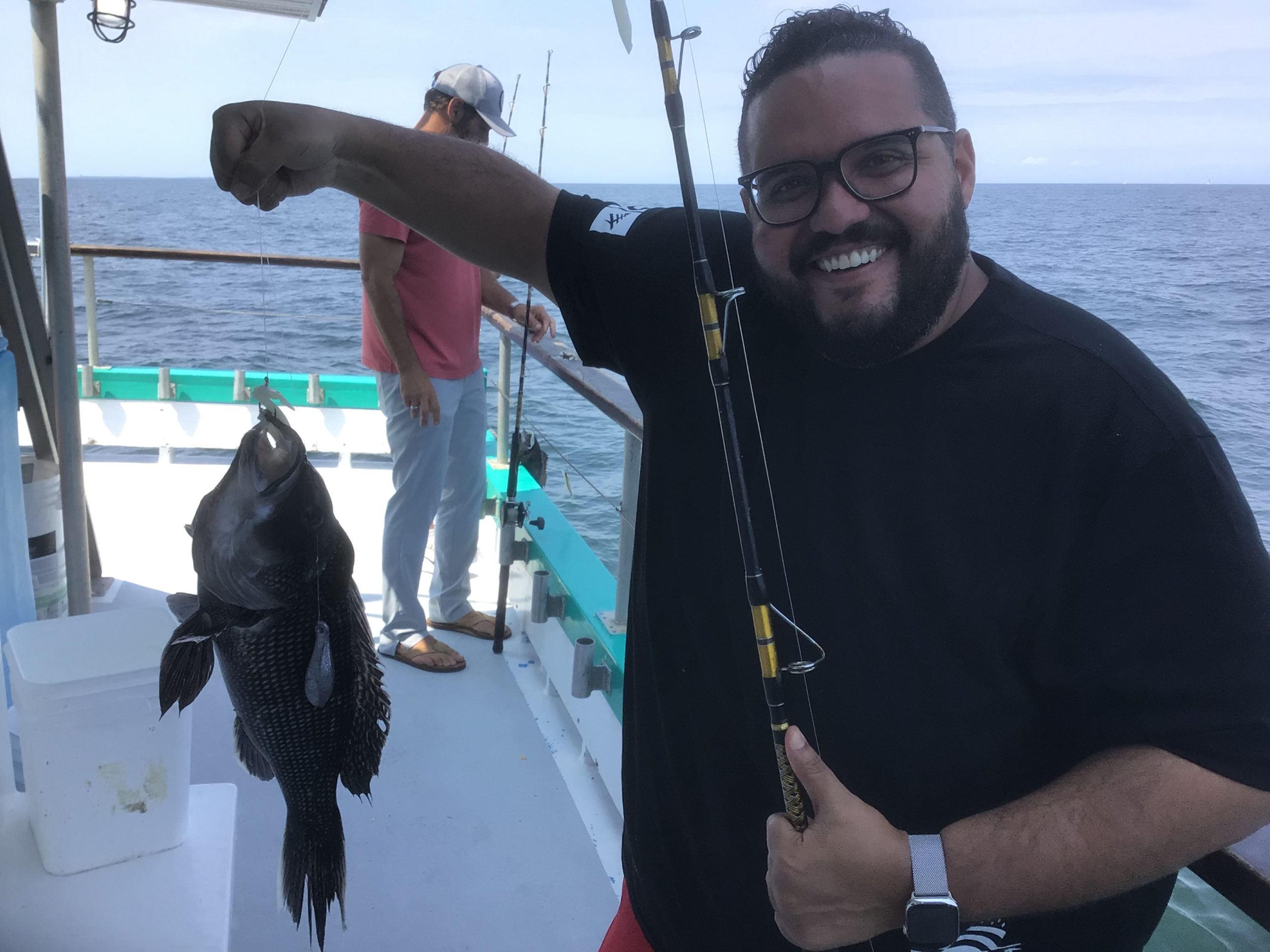 a couple of people that are standing in the snow