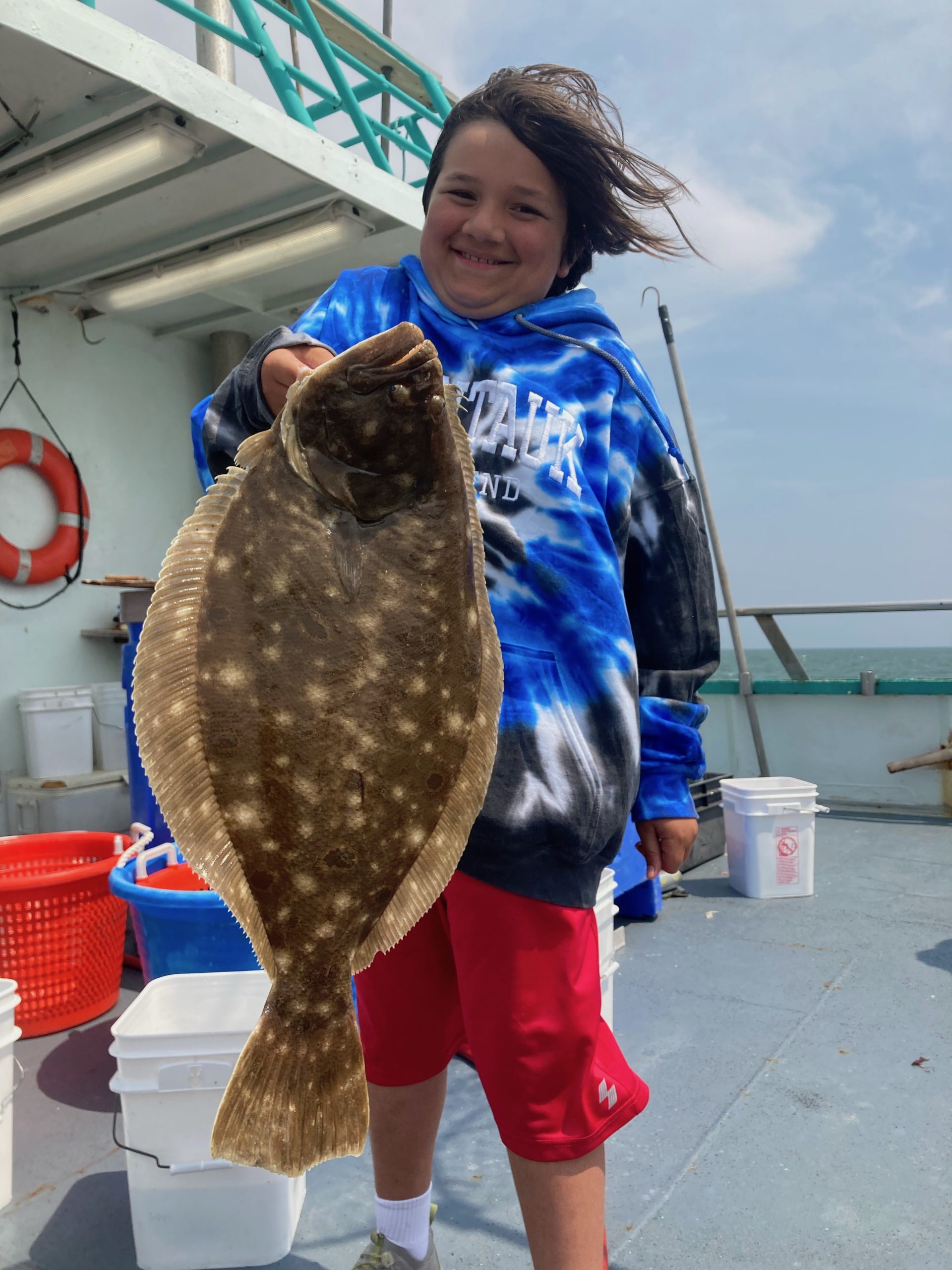 a person standing in front of a statue