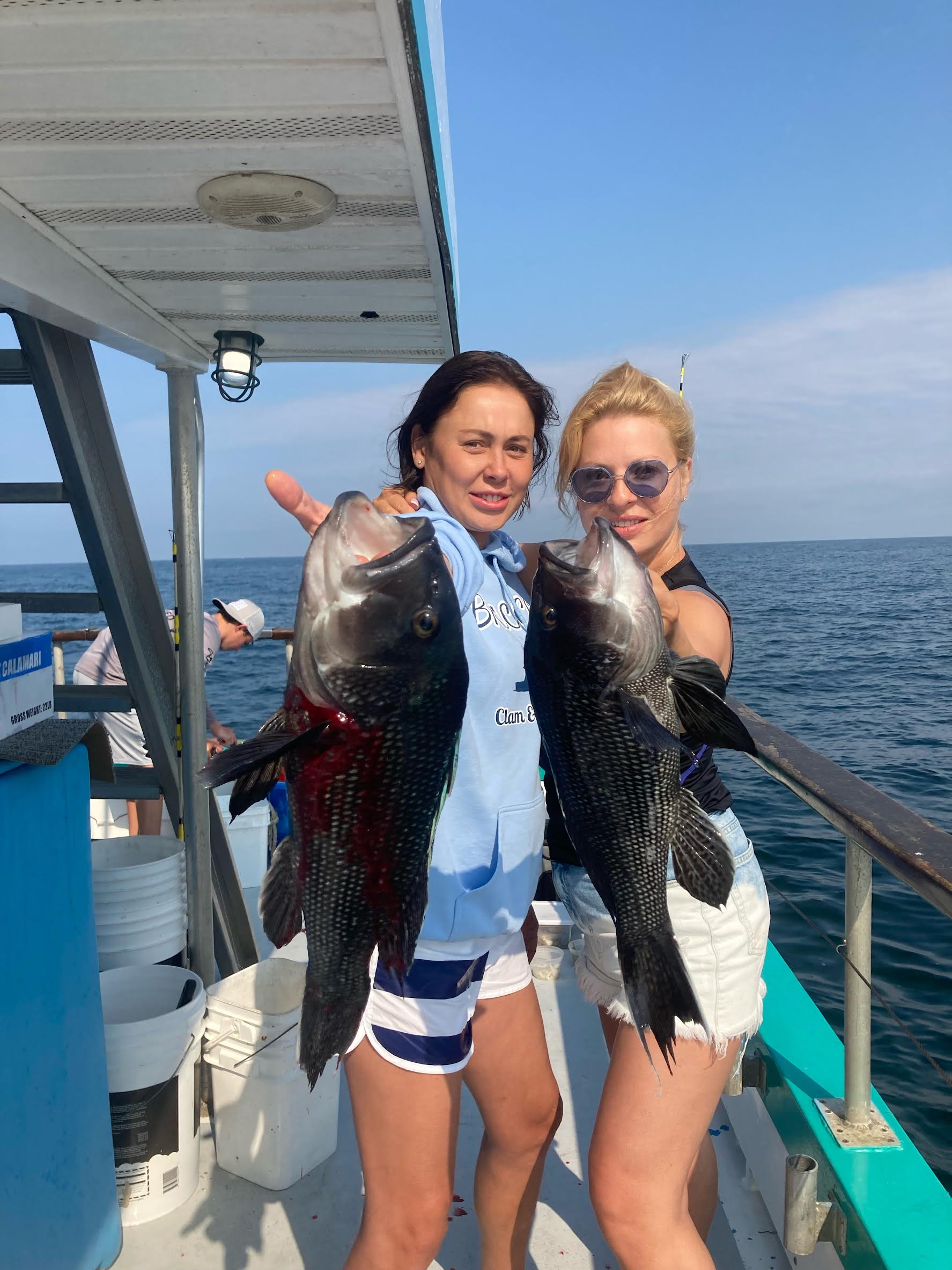 a person standing in front of a body of water