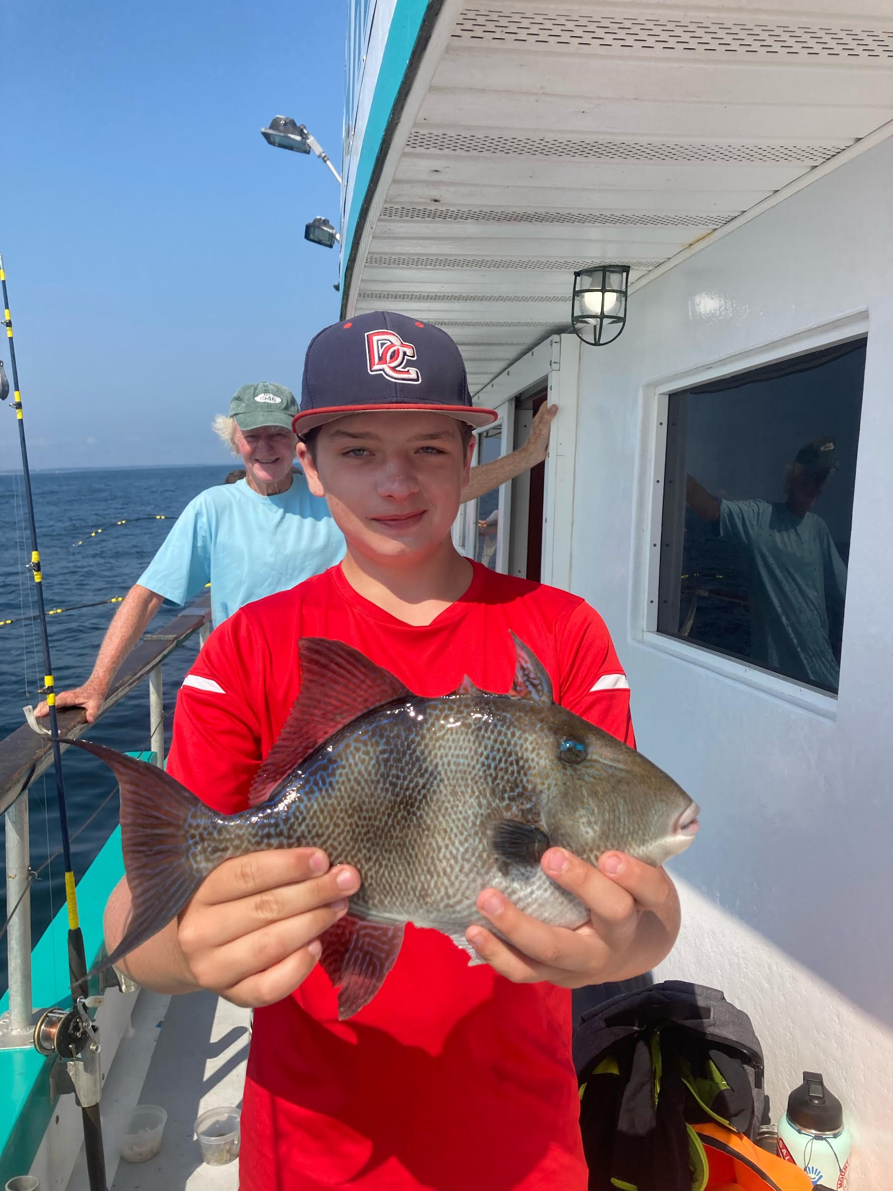 a person holding a fish