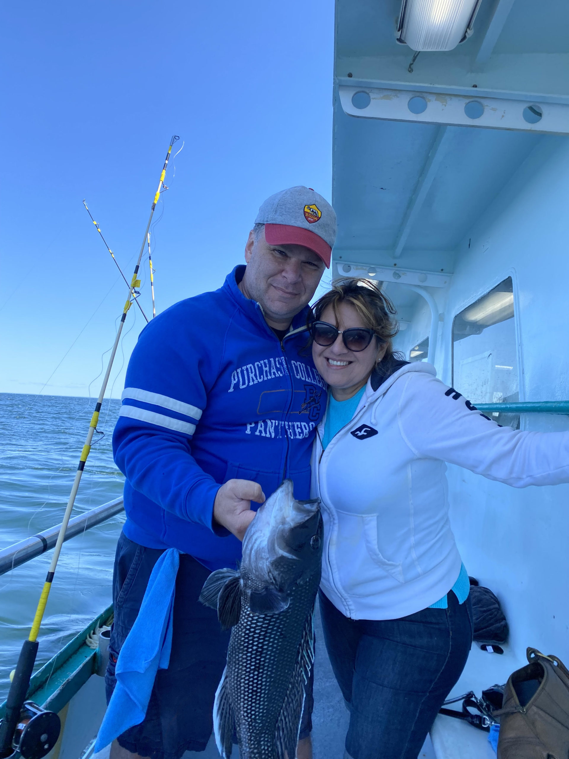 a person holding a fish