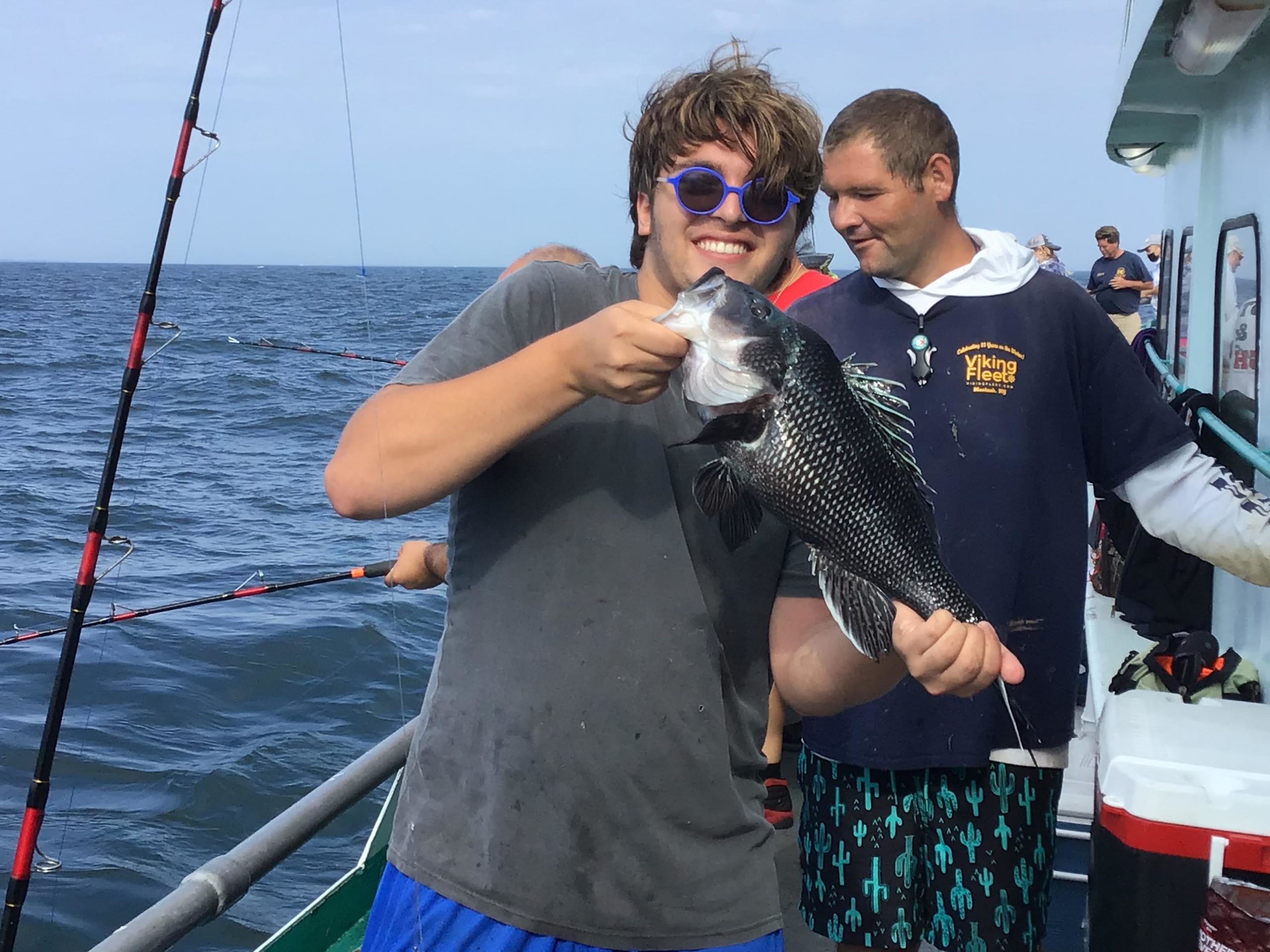 a man standing on a boat in the water