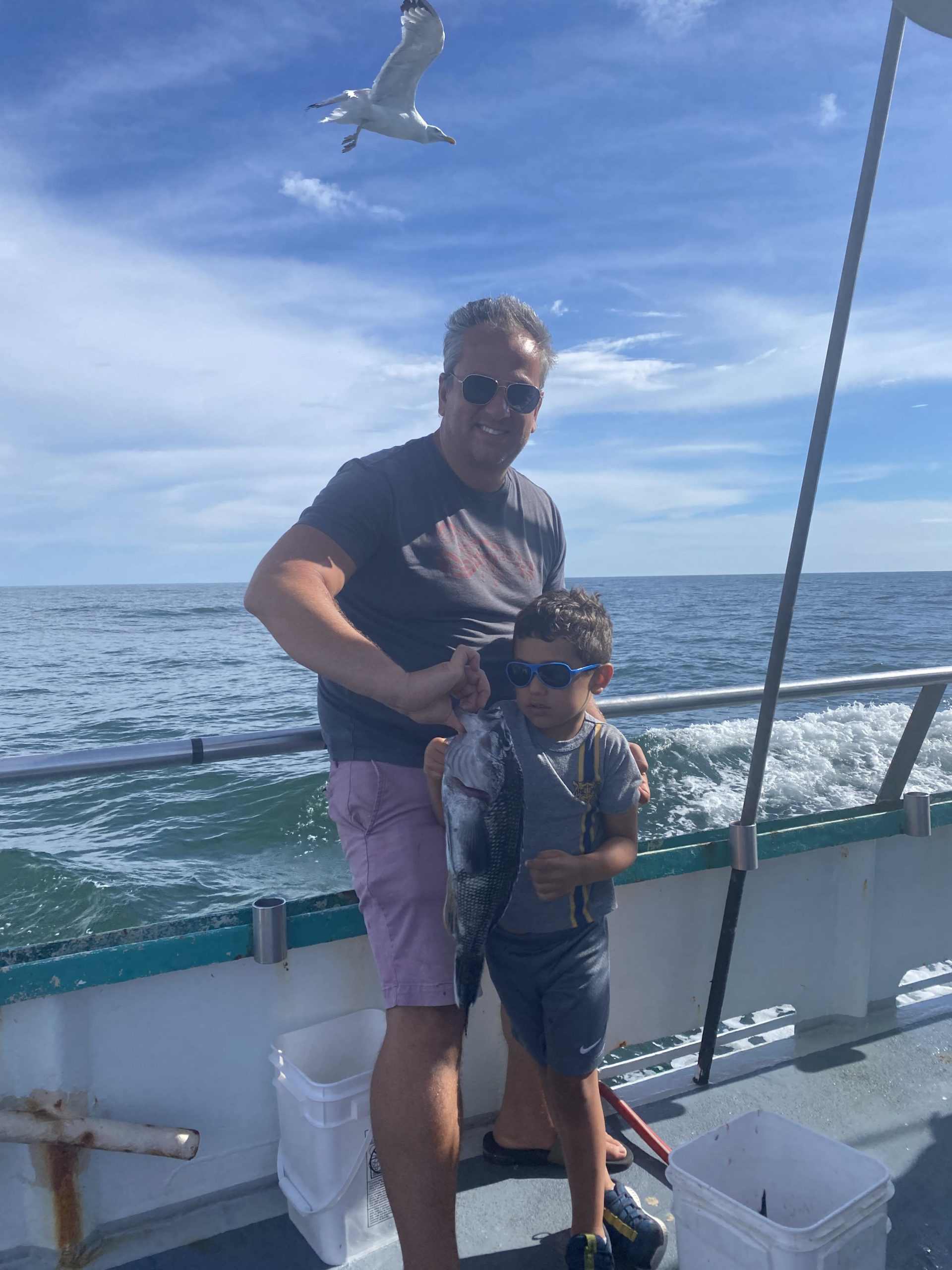 Cyrus Habib standing next to a body of water