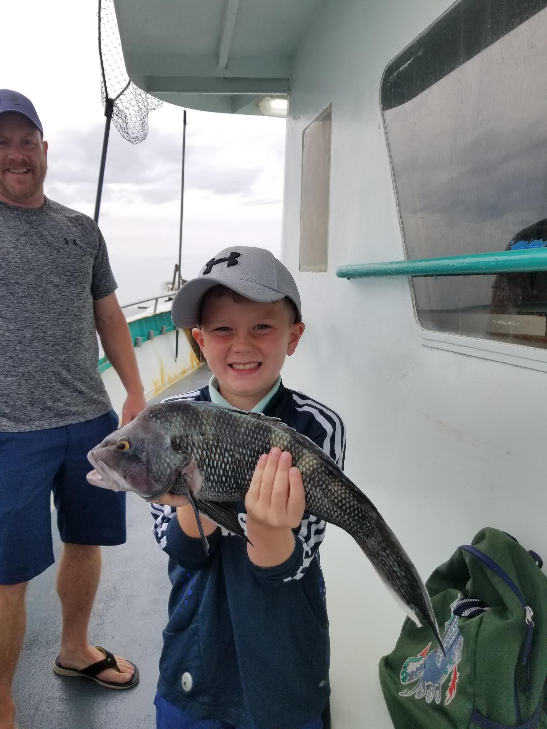 a person holding a stuffed animal