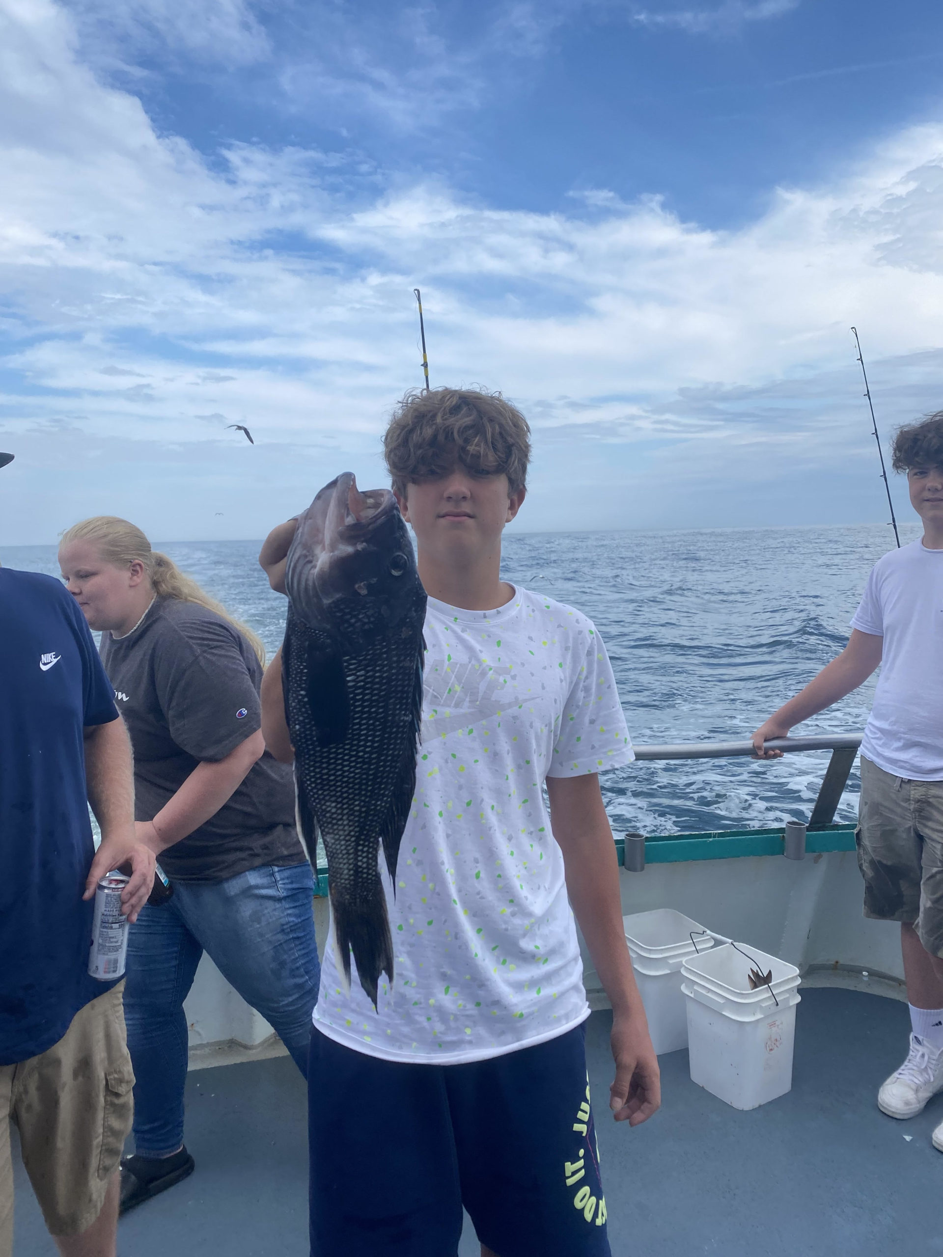 a group of people standing in the water