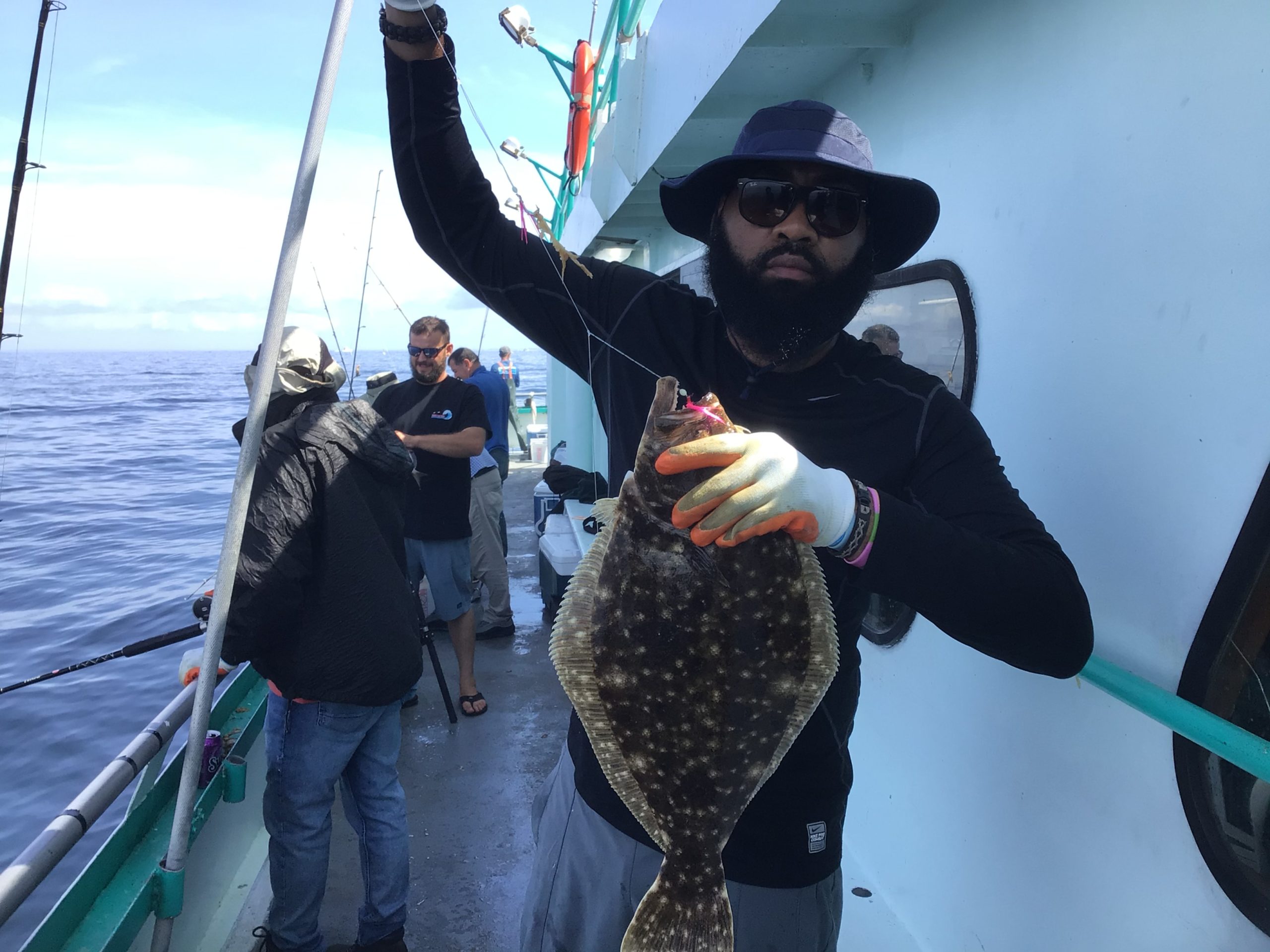 a person standing on a boat in the water