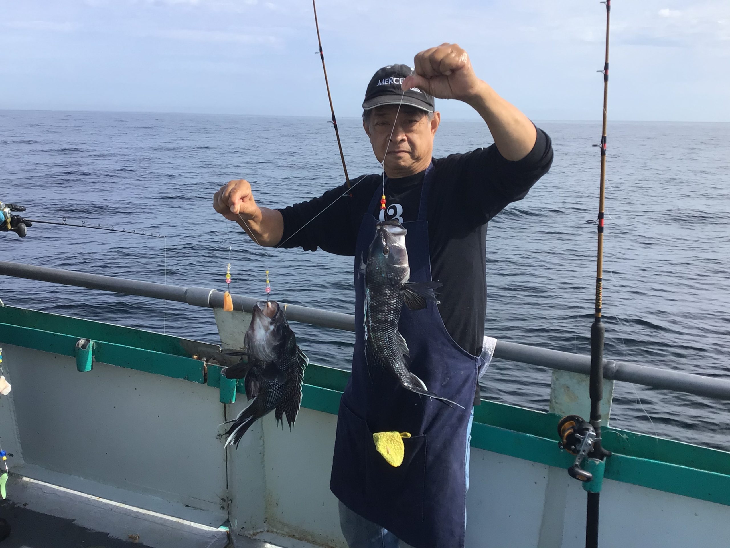 Salahuddin of Selangor standing next to a body of water
