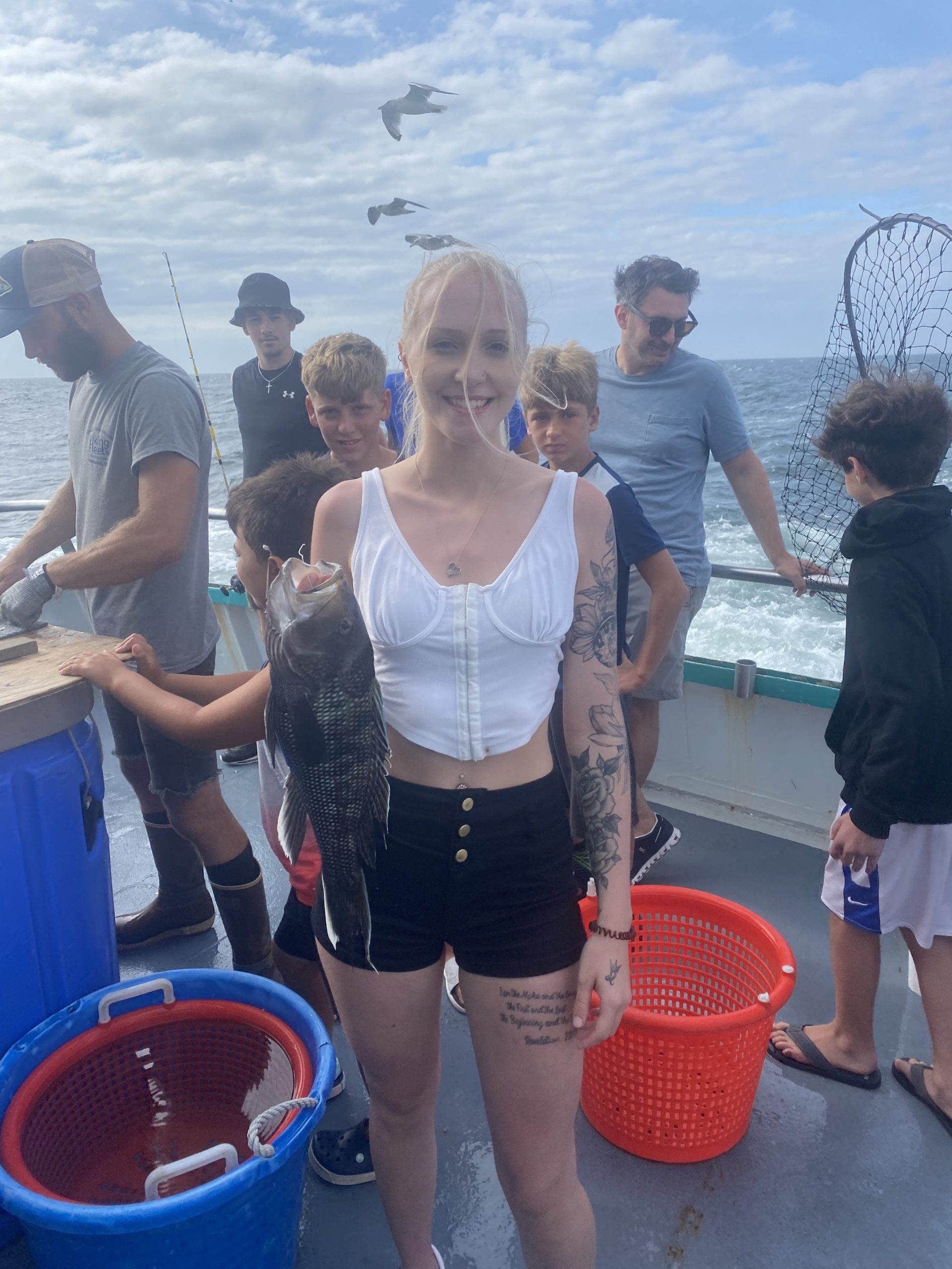 a group of people standing around each other