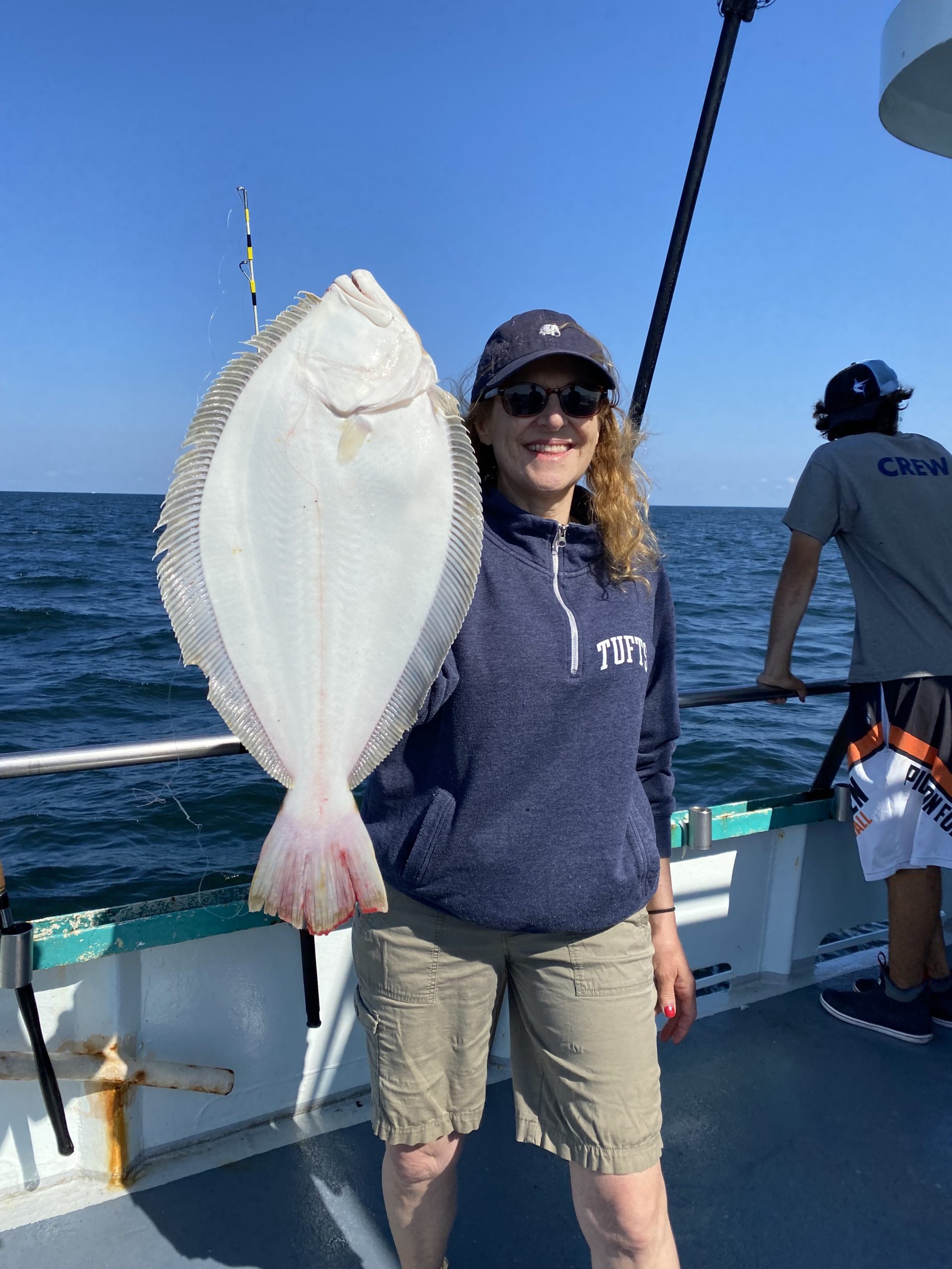 a person standing on a boat in the water