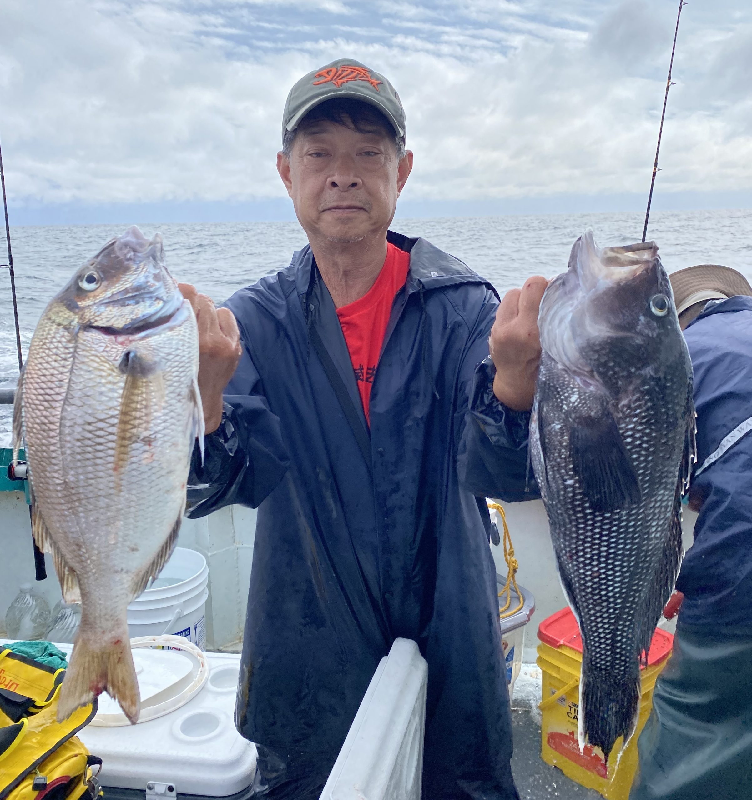 a man holding a fish