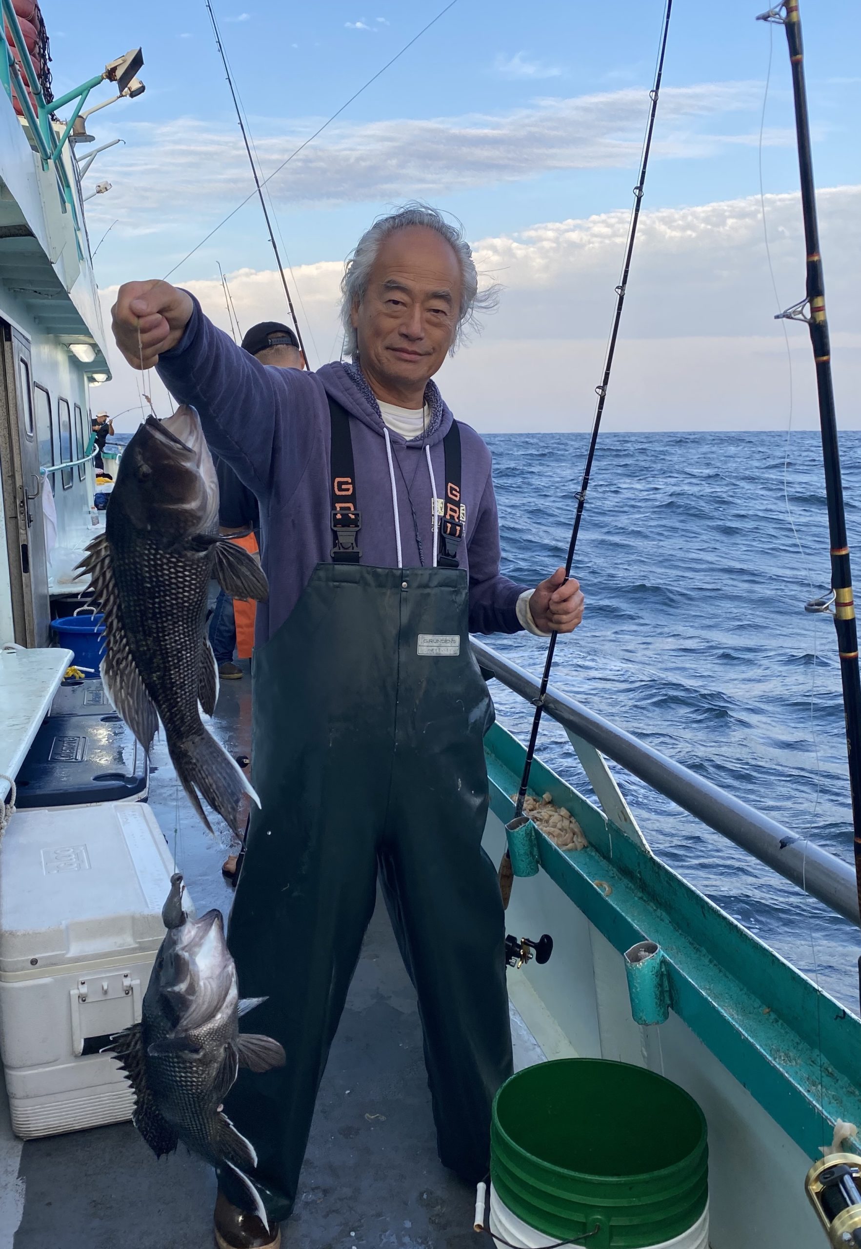 a person standing on a boat in the water