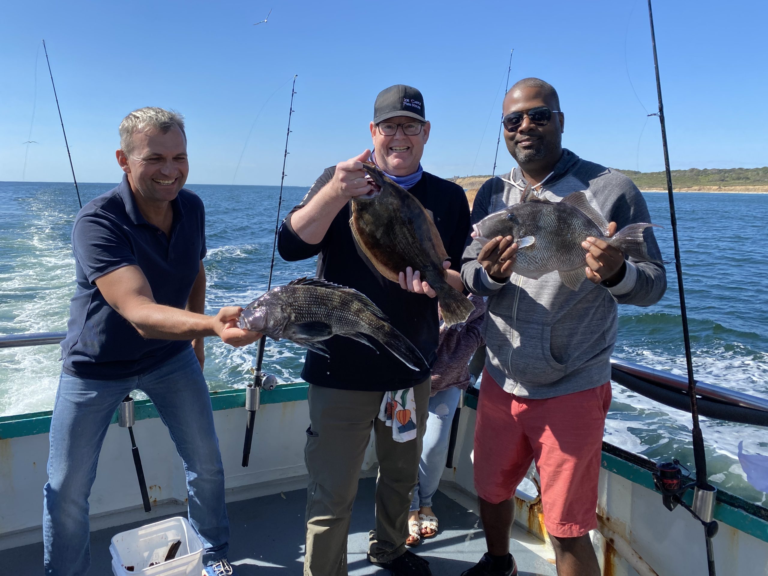 a person holding a fish in the water