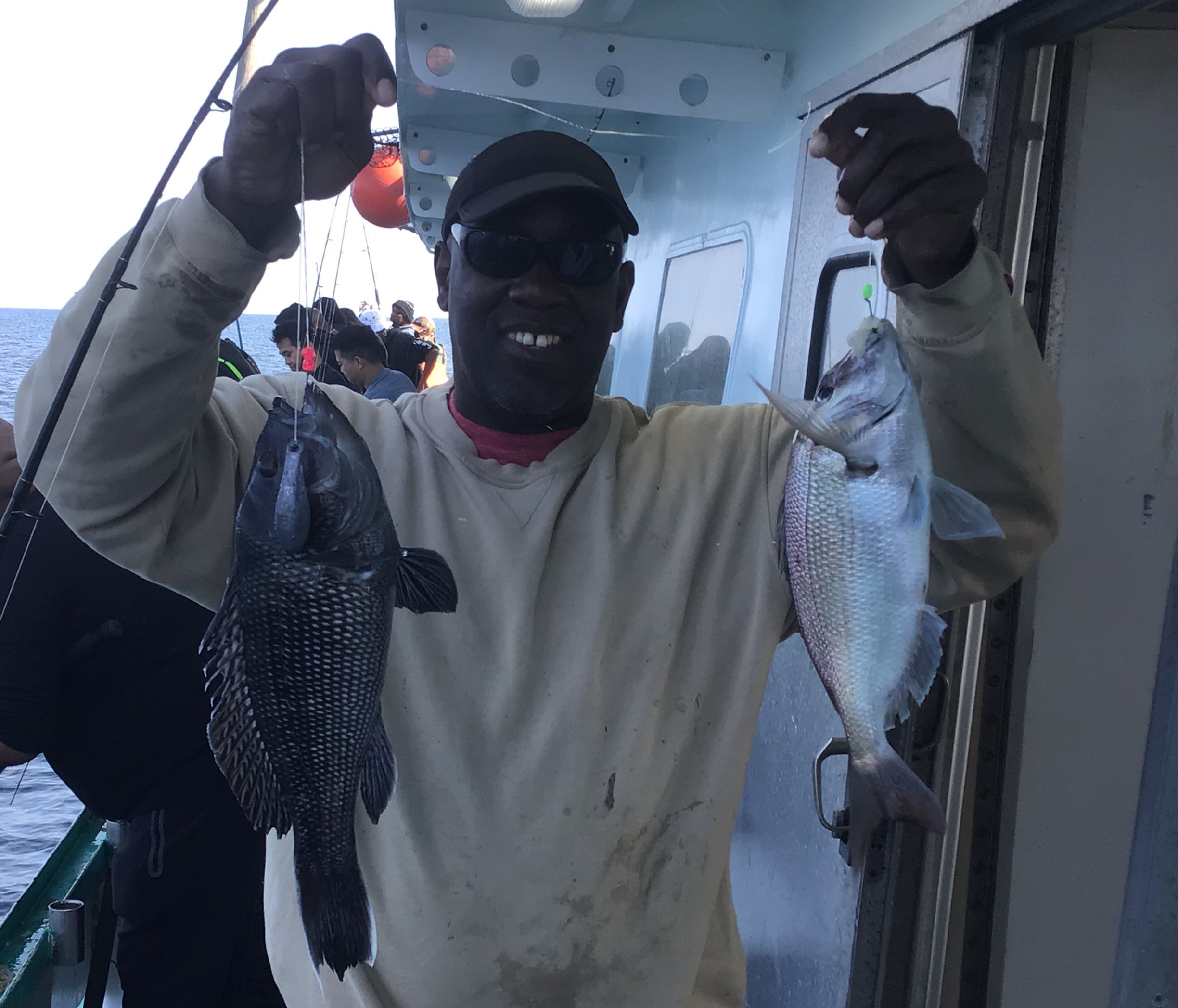 a person holding a fish