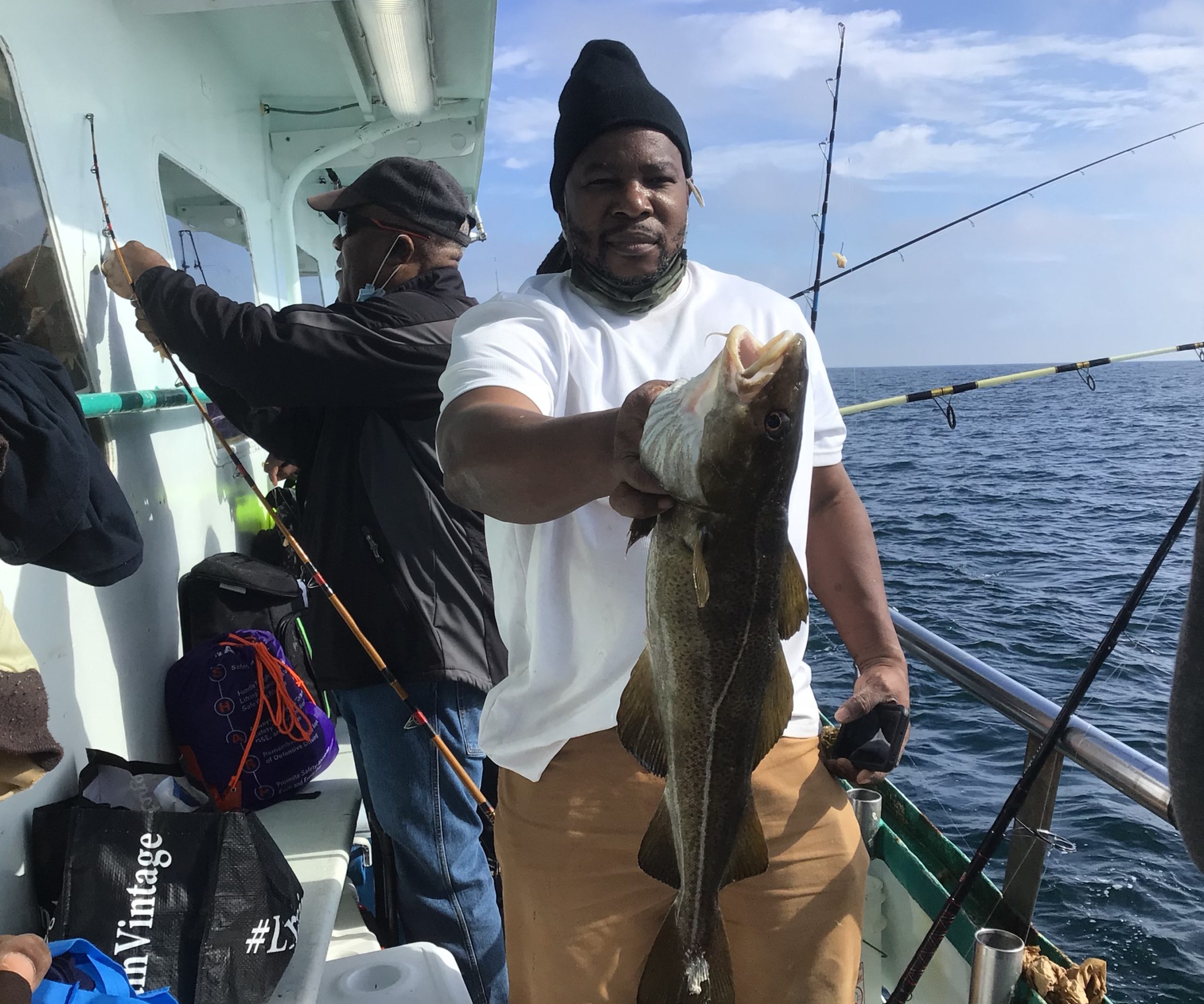a couple of people on a boat in the water