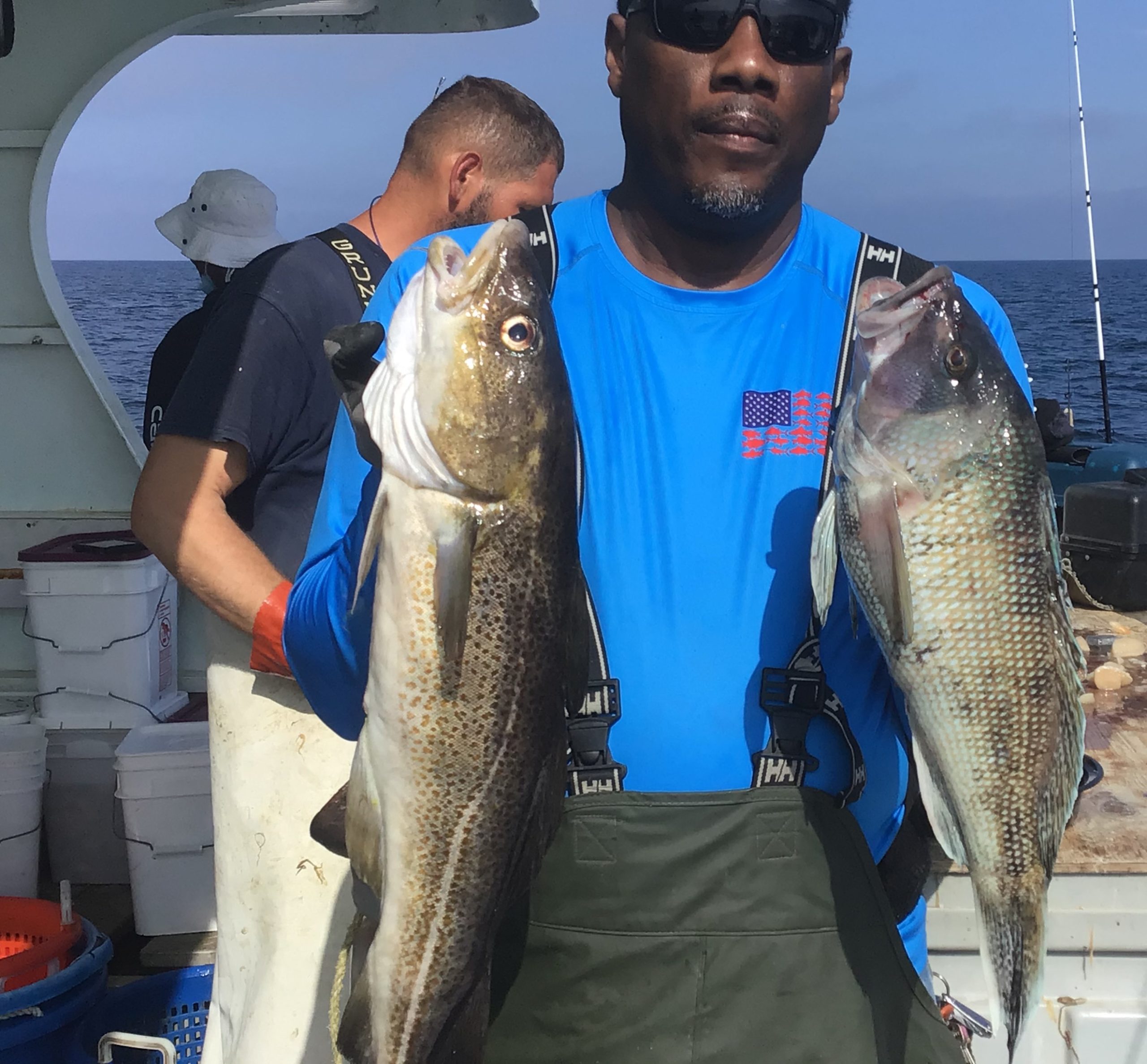 a man holding a fish