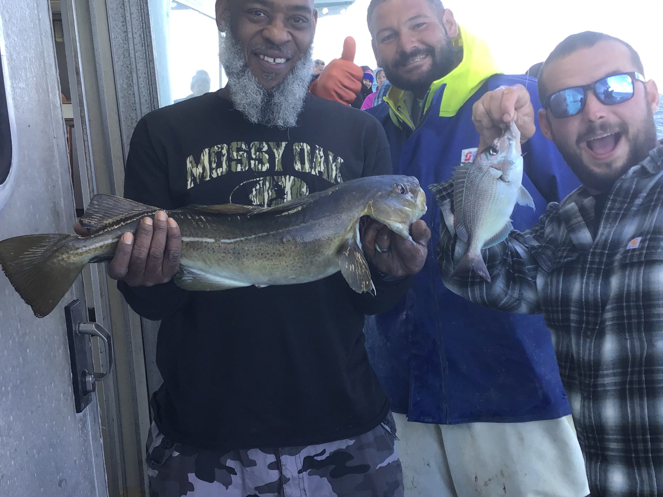 a man holding a fish
