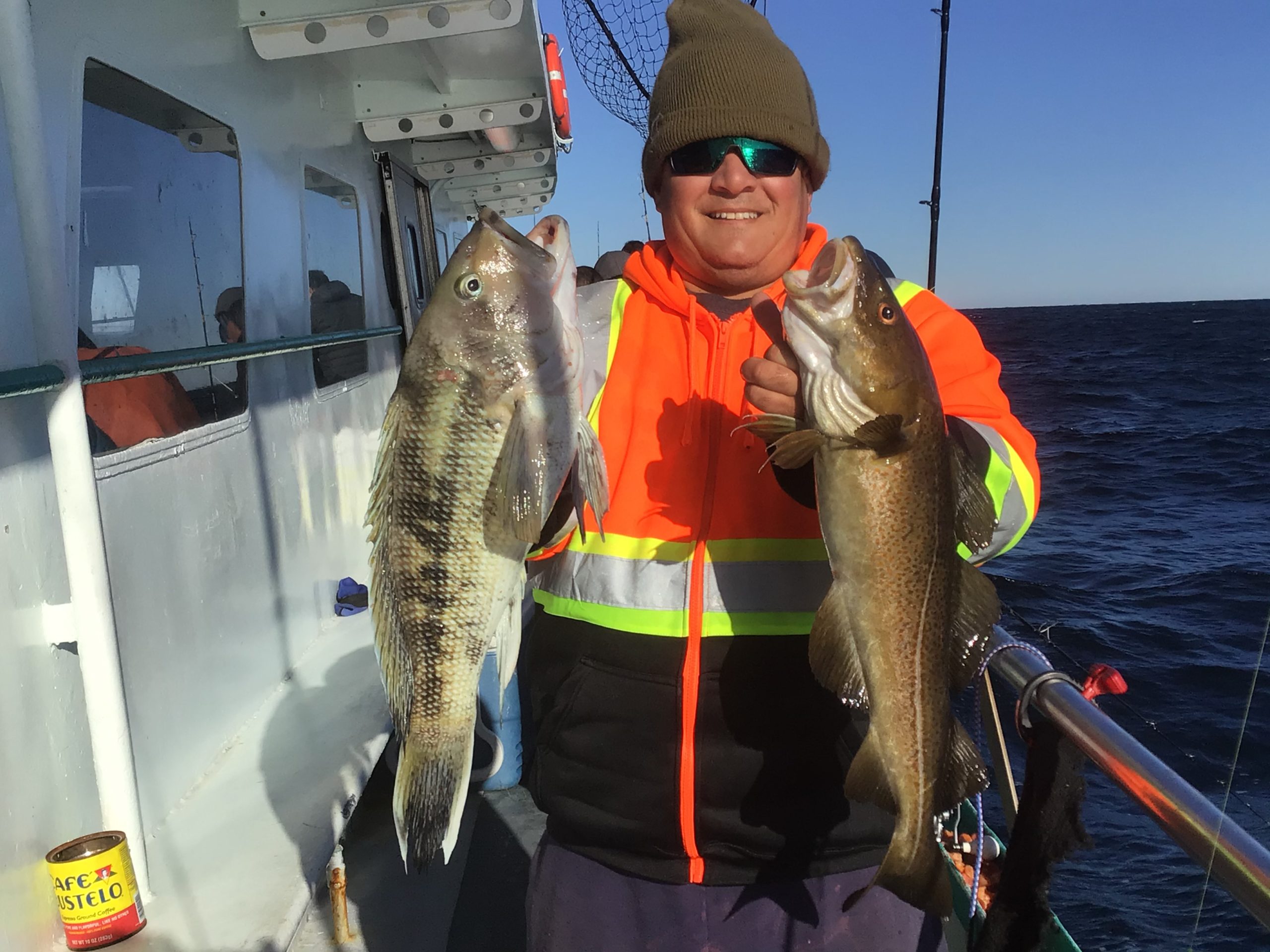 a man holding a fish